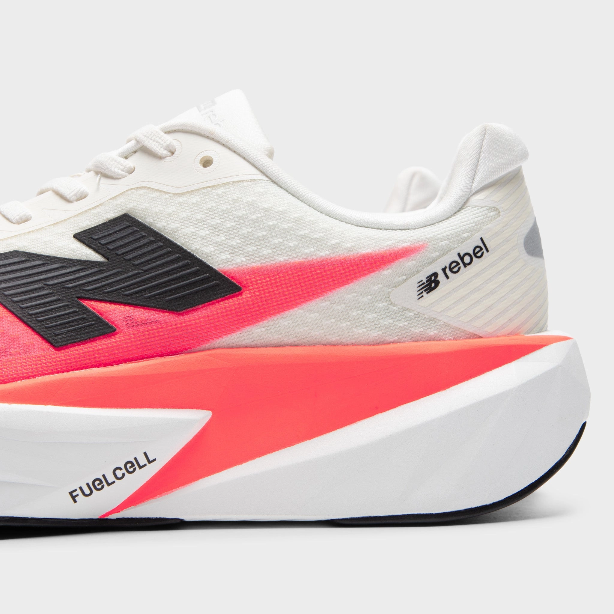 New Balance FuelCell Rebel v5 White / Pink shoe cover running in natural tracks shoes