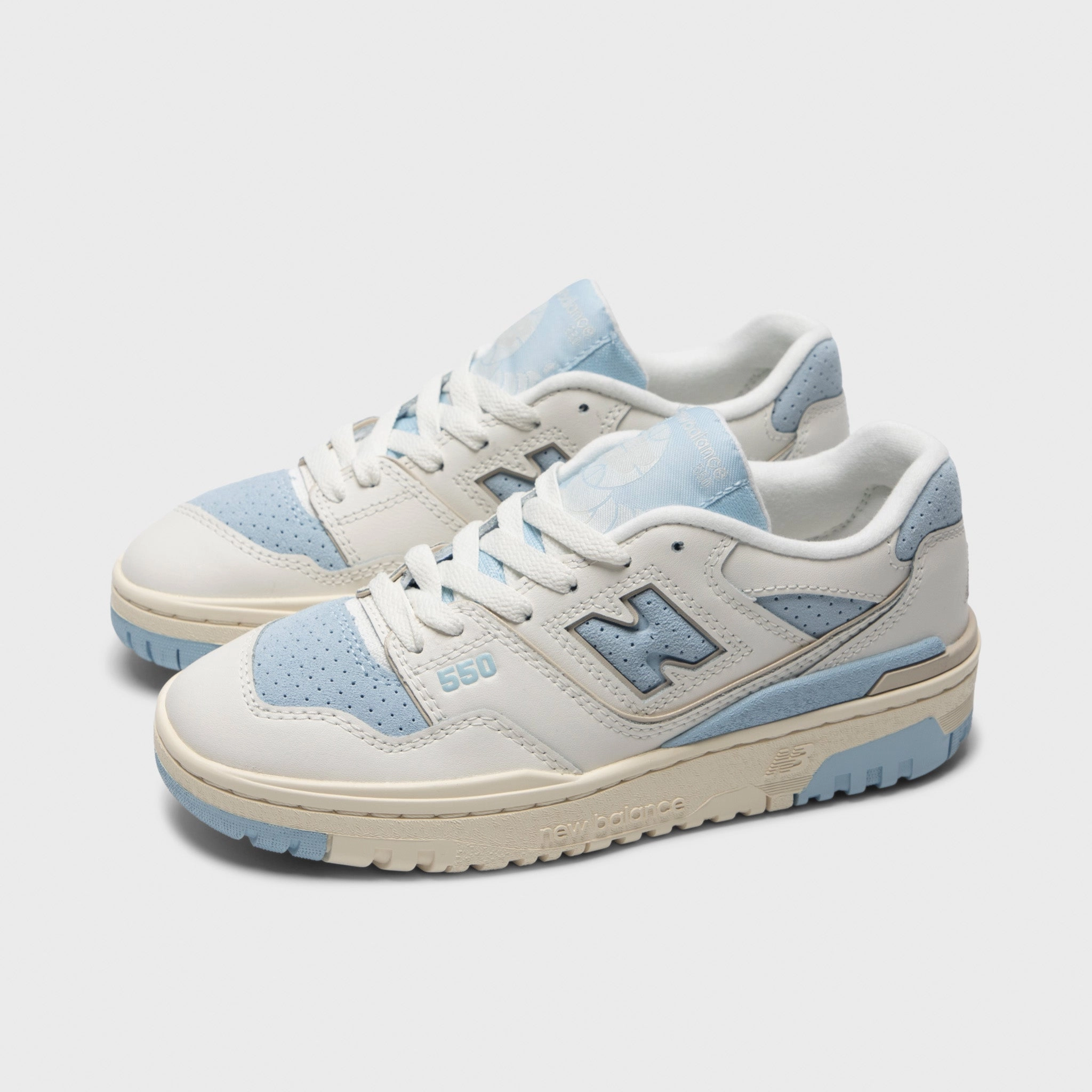 New Balance Juniors' 550 White / Light Blue Rolling Transition Geometry