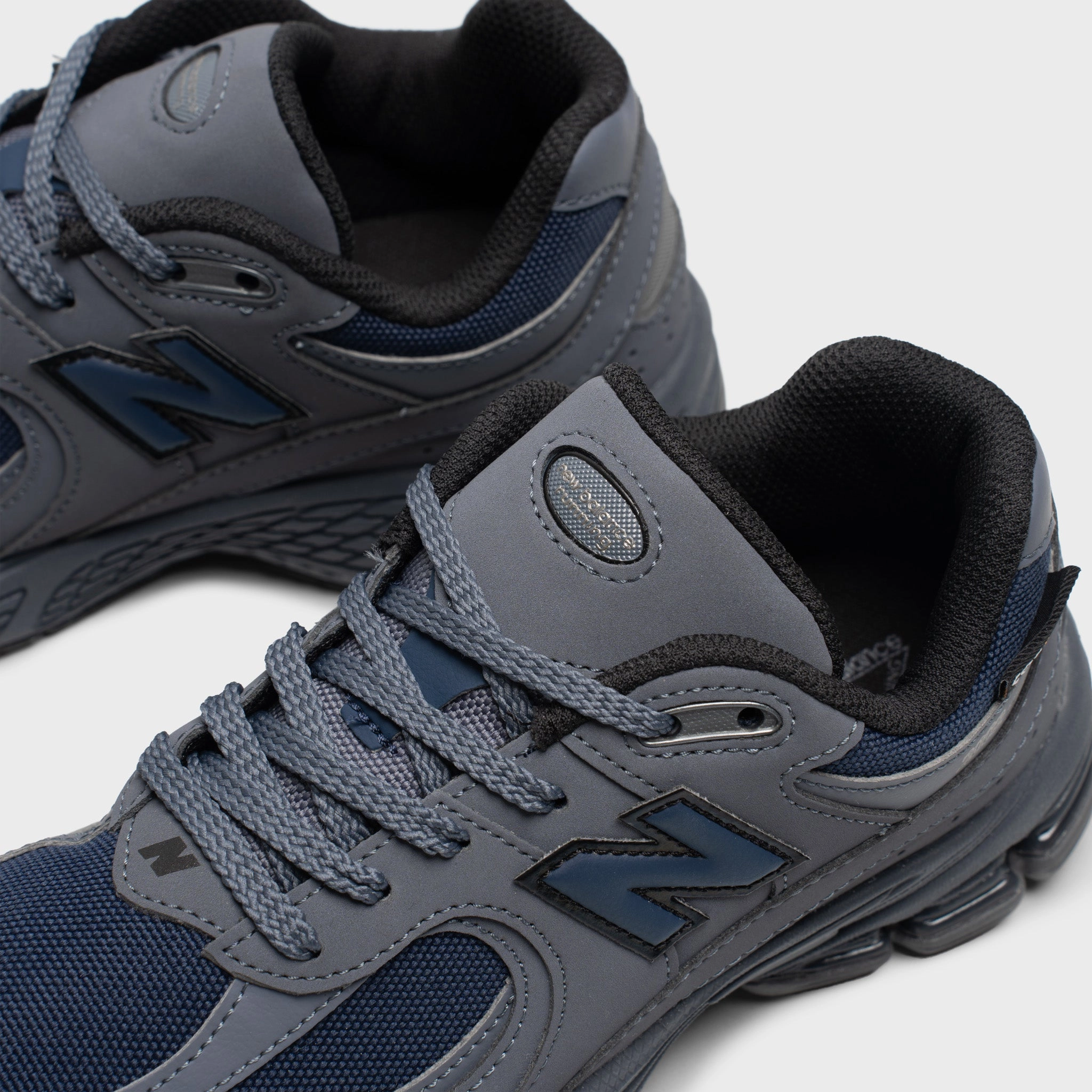 high - performance footwear Racing performance New Balance Juniors' 2002R / Dark Grey