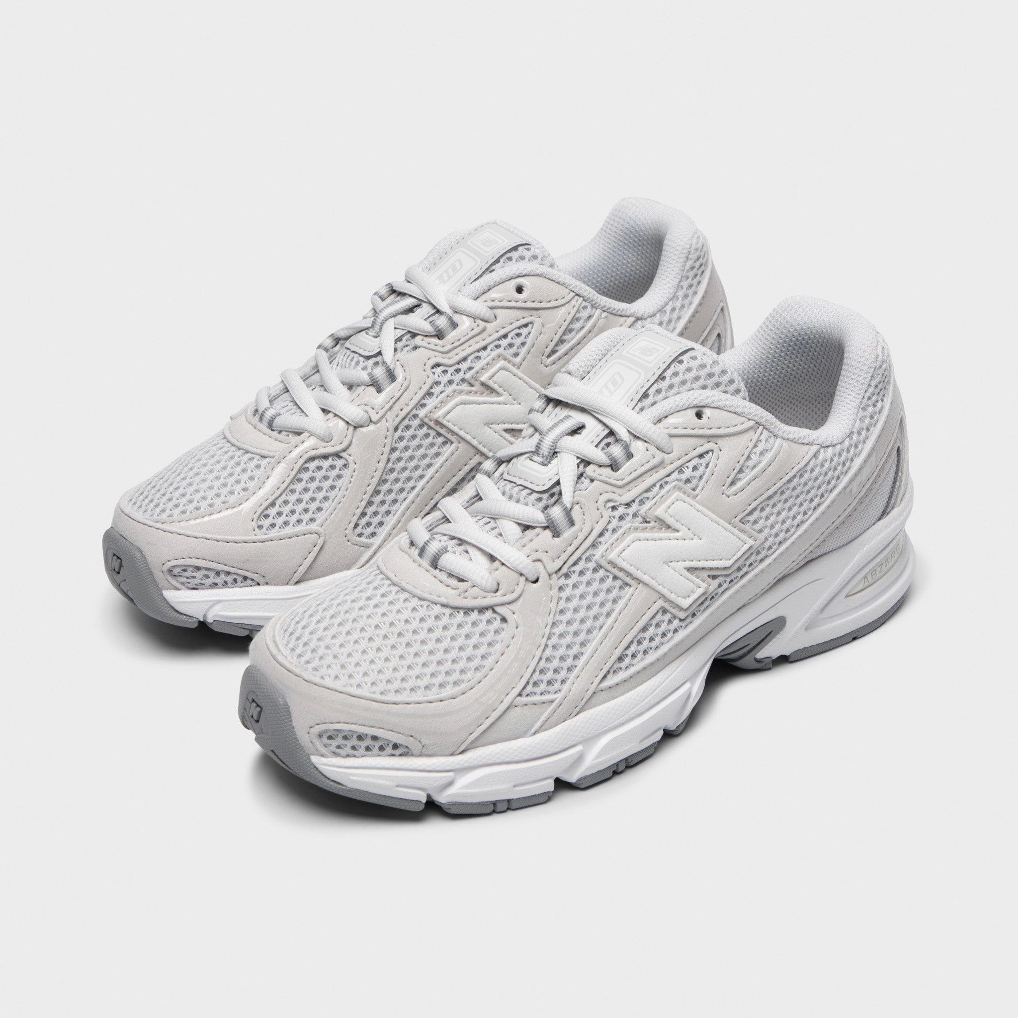 New Balance Juniors' 740 Grey Matter / White Shock Reducing team shoes
