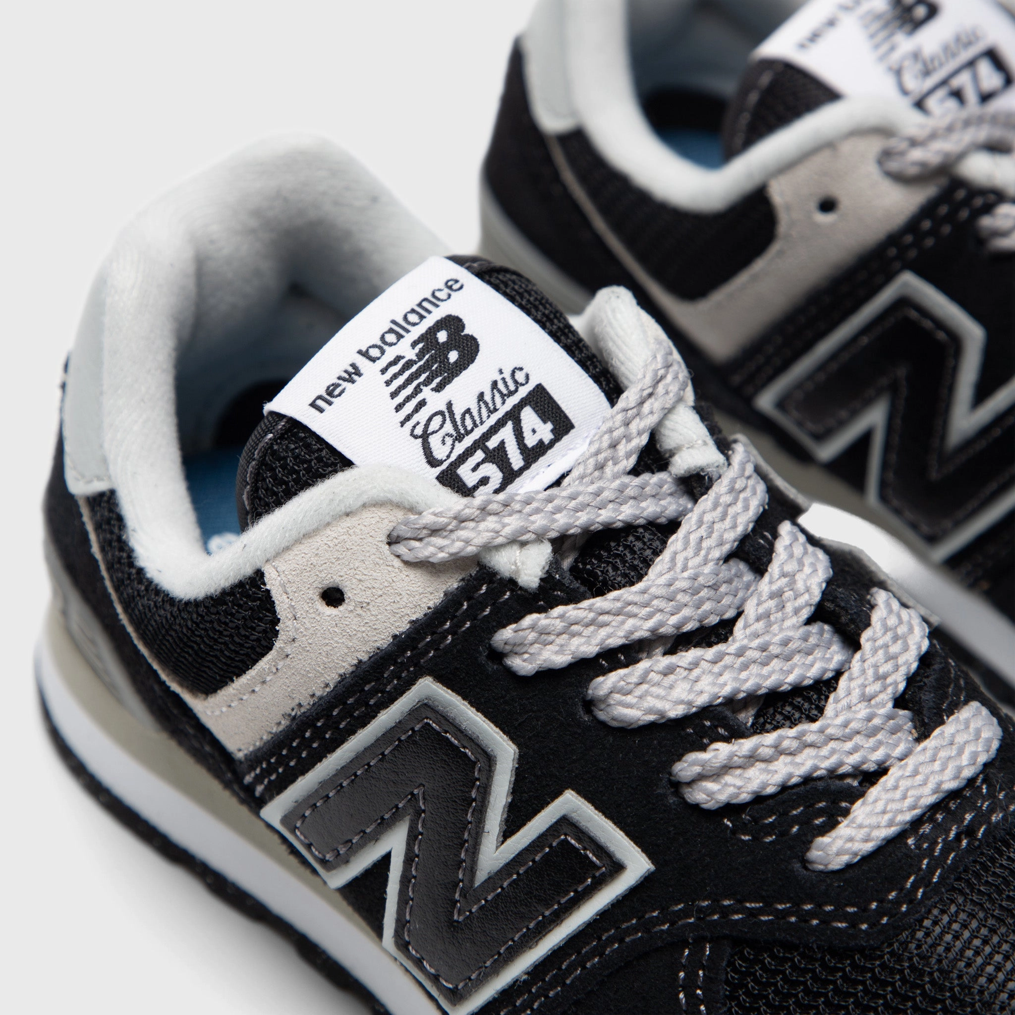 New Balance Children's 574 Black / White impact - protection - mechanism shoes
