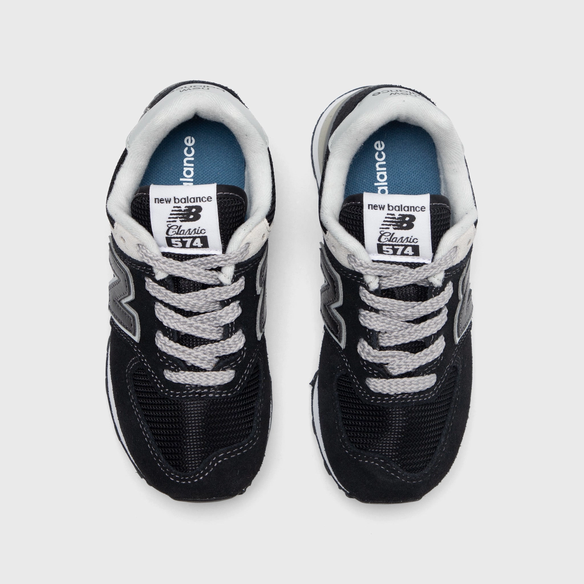New Balance Children's 574 Black / White Stretchable Fabric