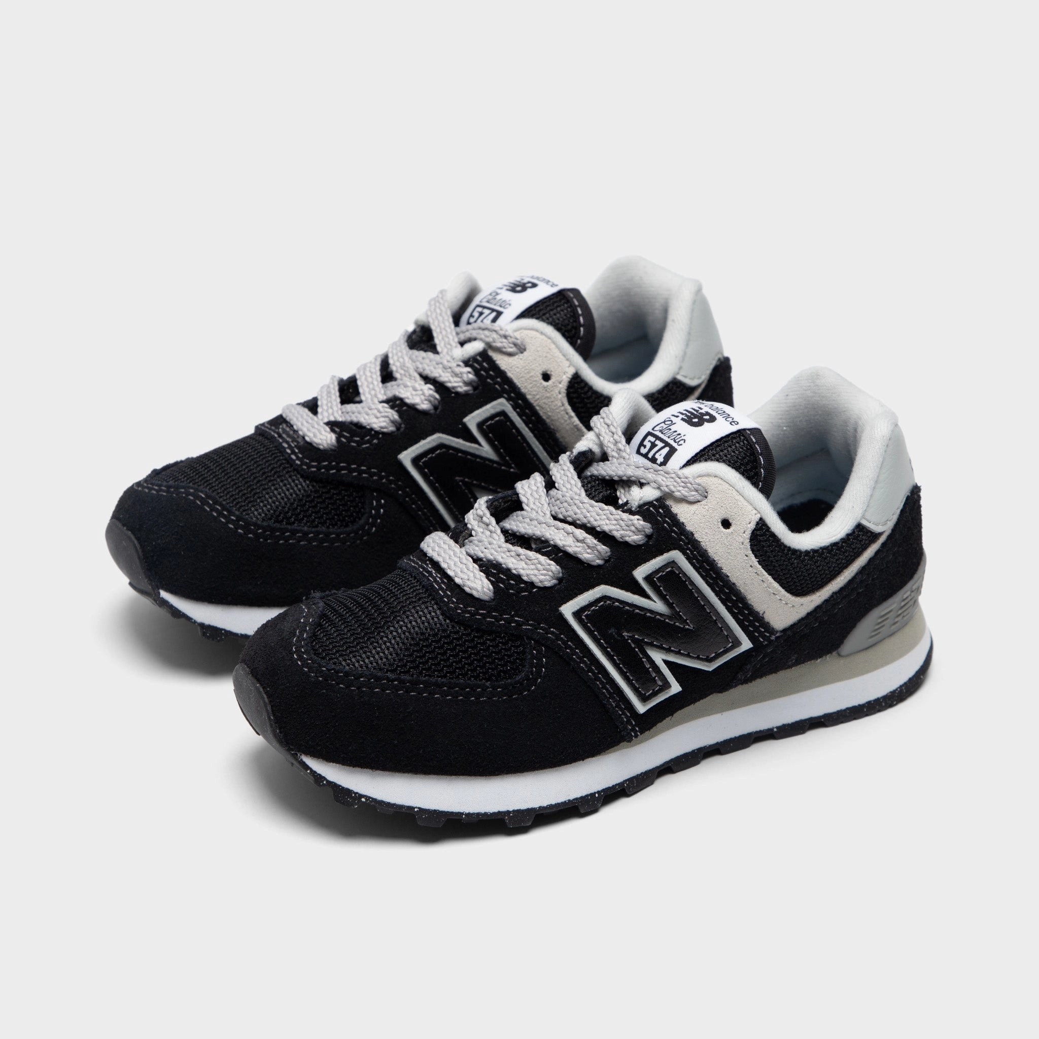 New Balance Children's 574 Black / White running shoes for fitness - oriented men