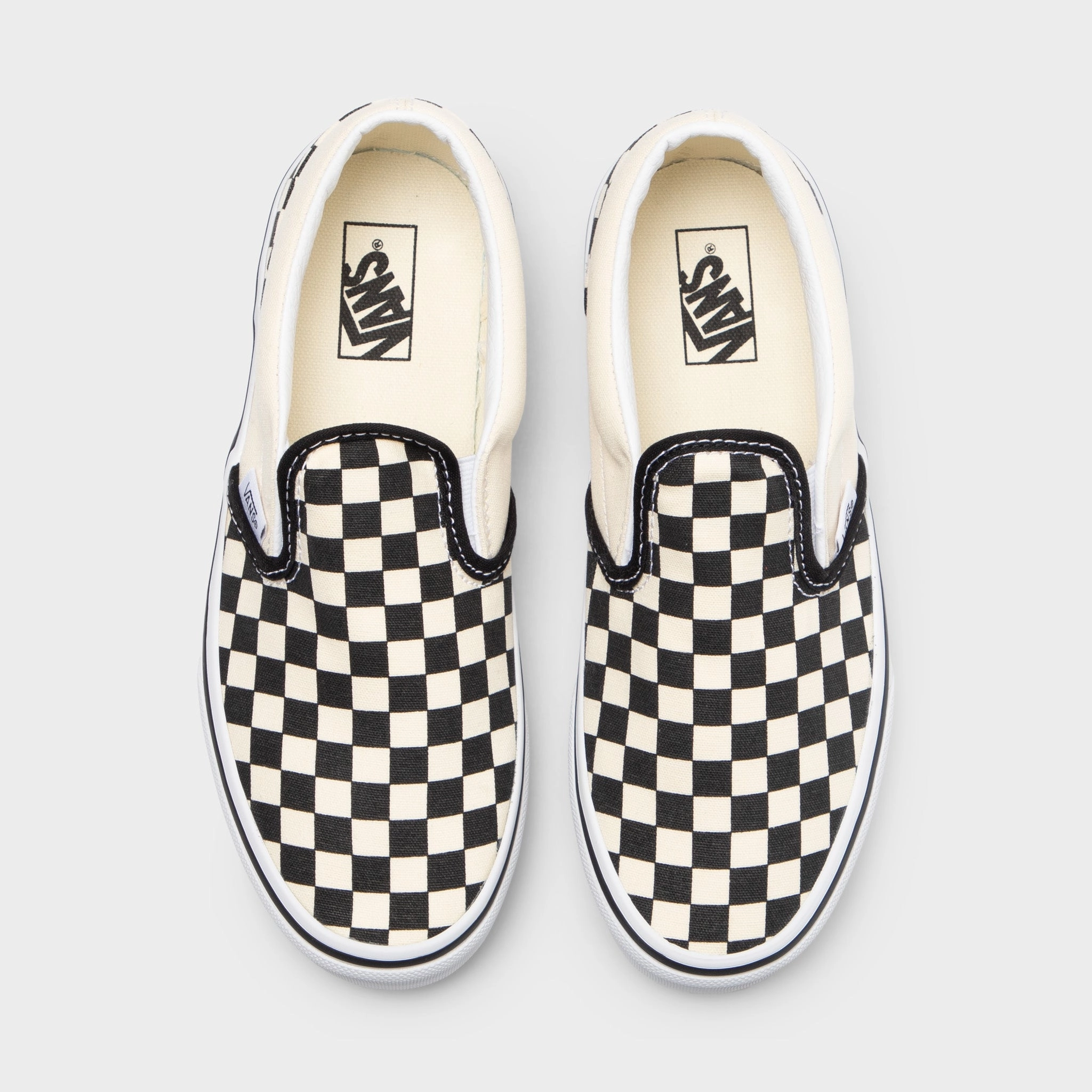 Vans Juniors' Checkerboard Classic Slip-On Black / White Feel Stable
