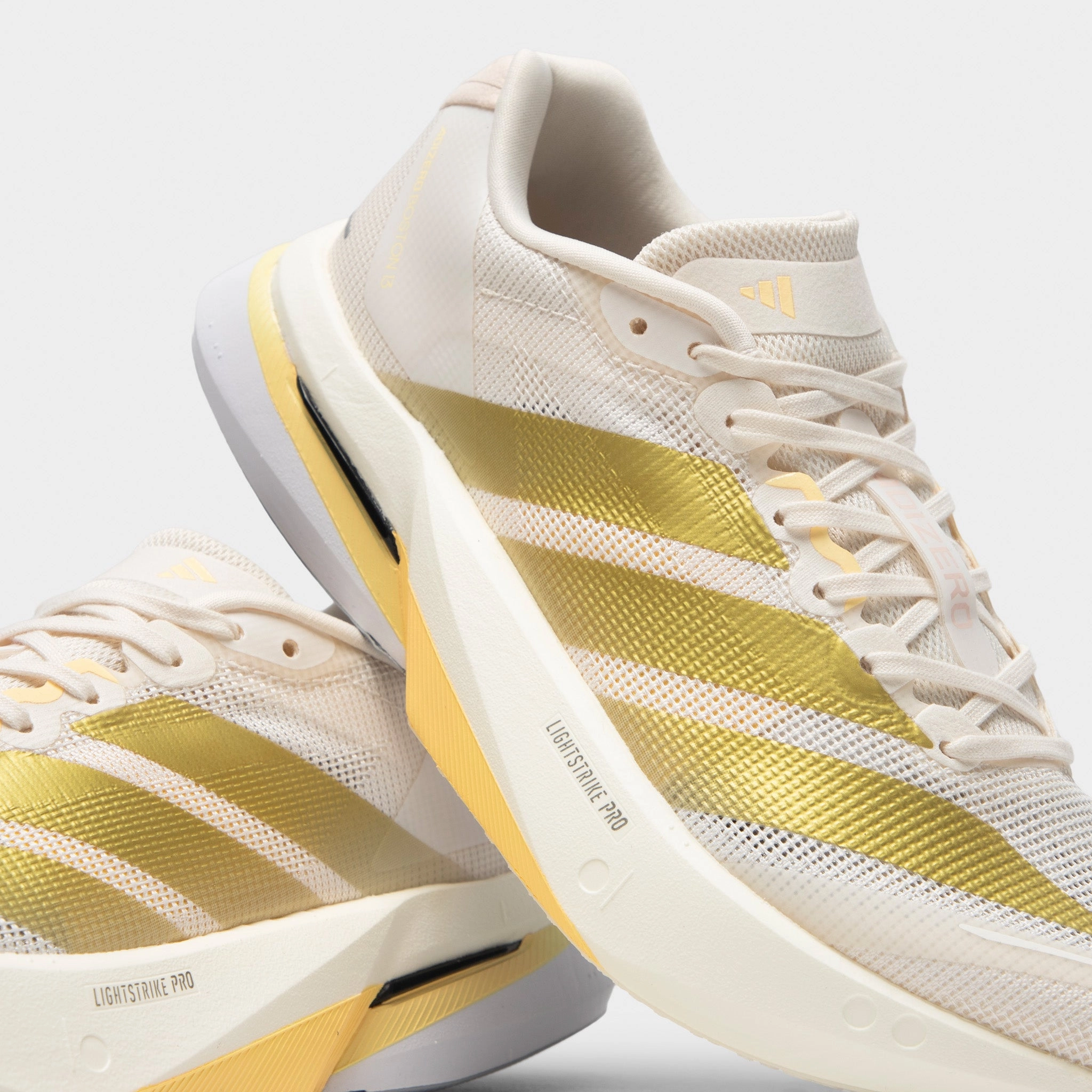 adidas Women's Adizero Boston 13 Chalk White / Gold Metallic - Orange Tint Weekend Trips