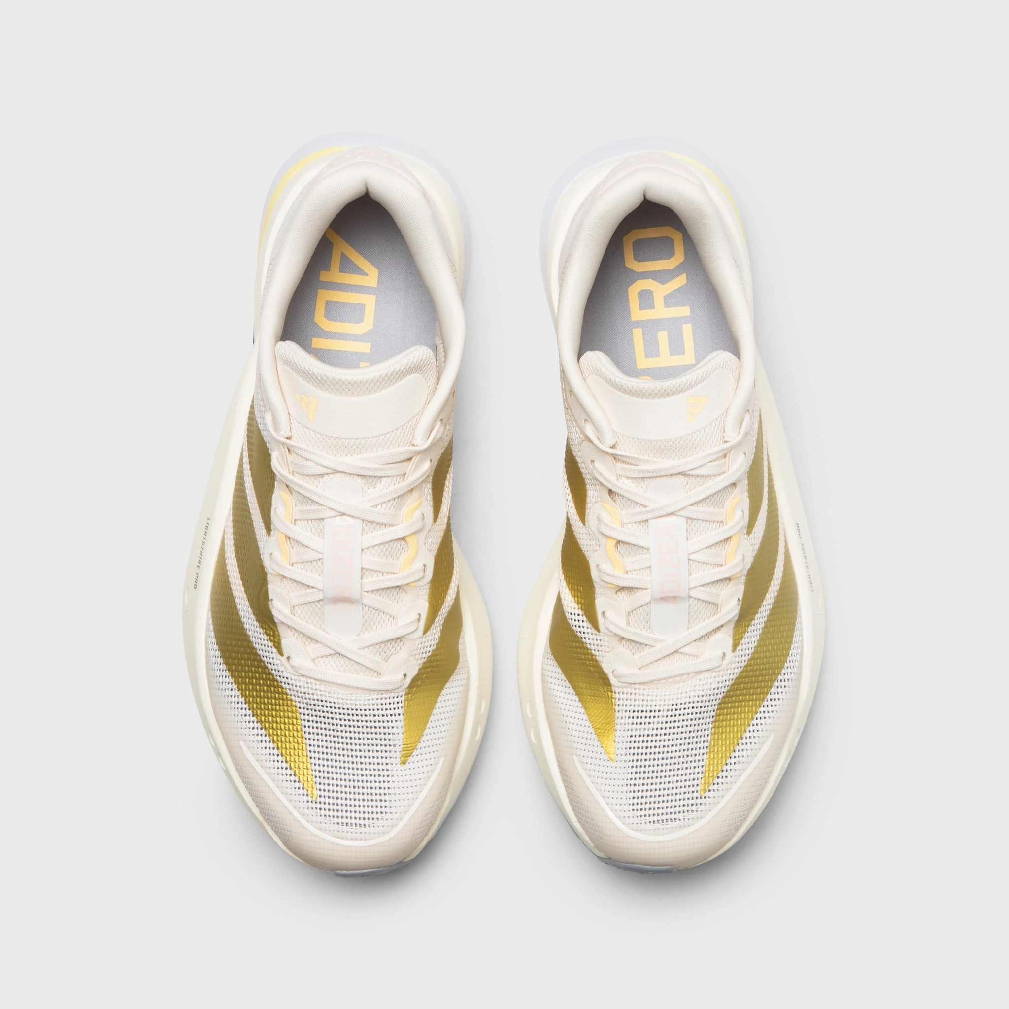 Soft Padding Decorative stitching adidas Women's Adizero Boston 13 Chalk White / Gold Metallic - Orange Tint