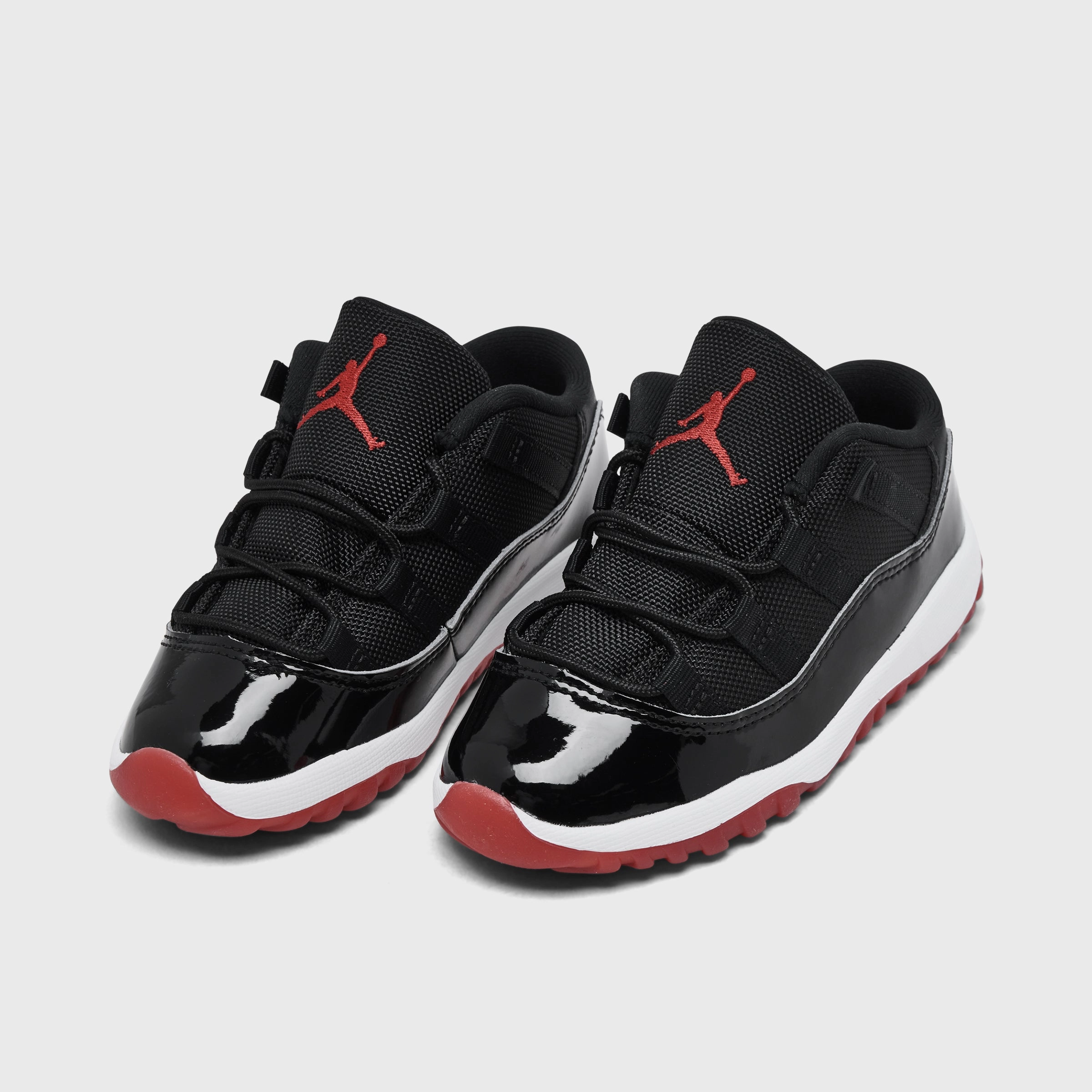 Jordan 11 Retro Low TD Black / Varsity Red - White Synthetic Stability Jump