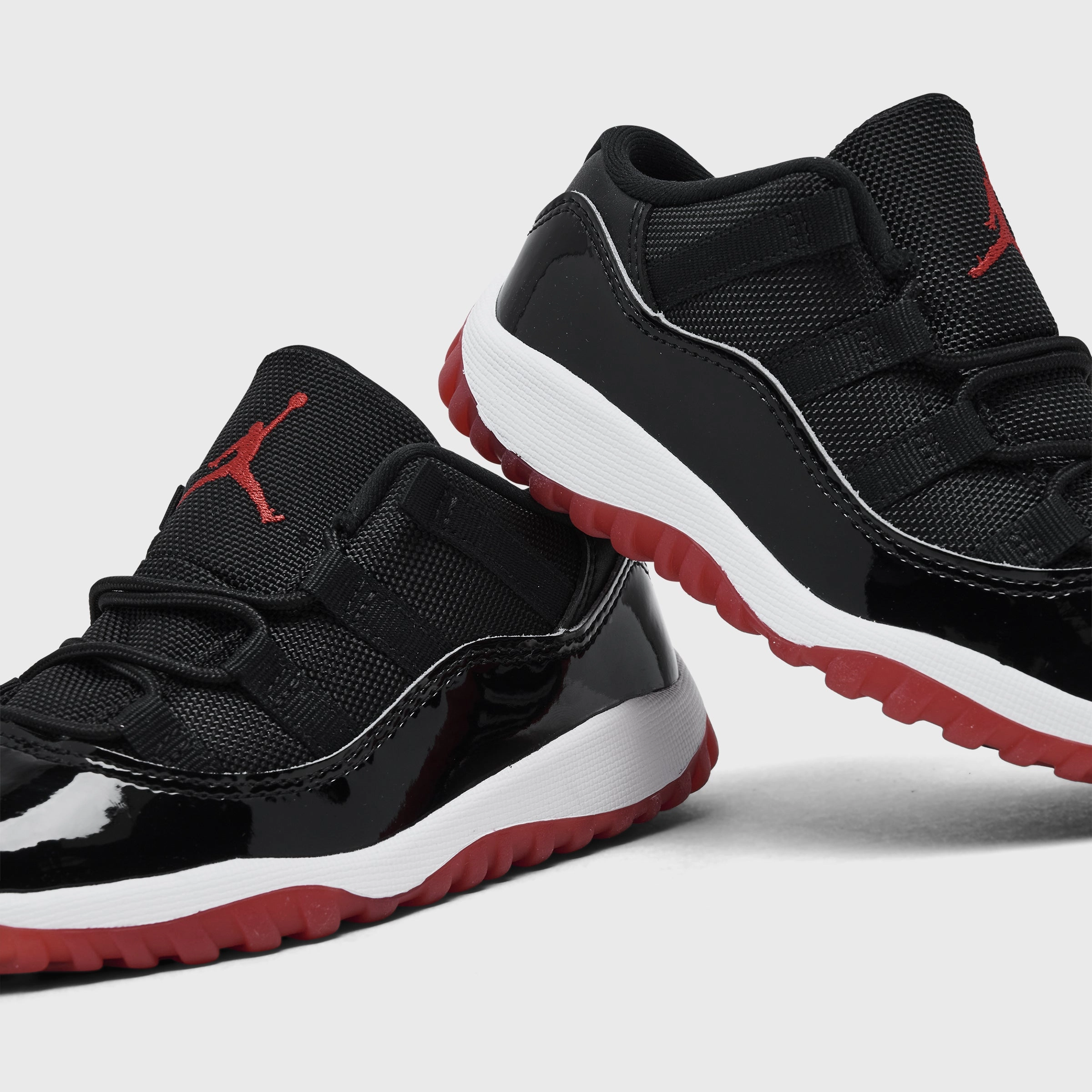 Hyper Elastic Midsole Jordan 11 Retro Low TD Black / Varsity Red - White