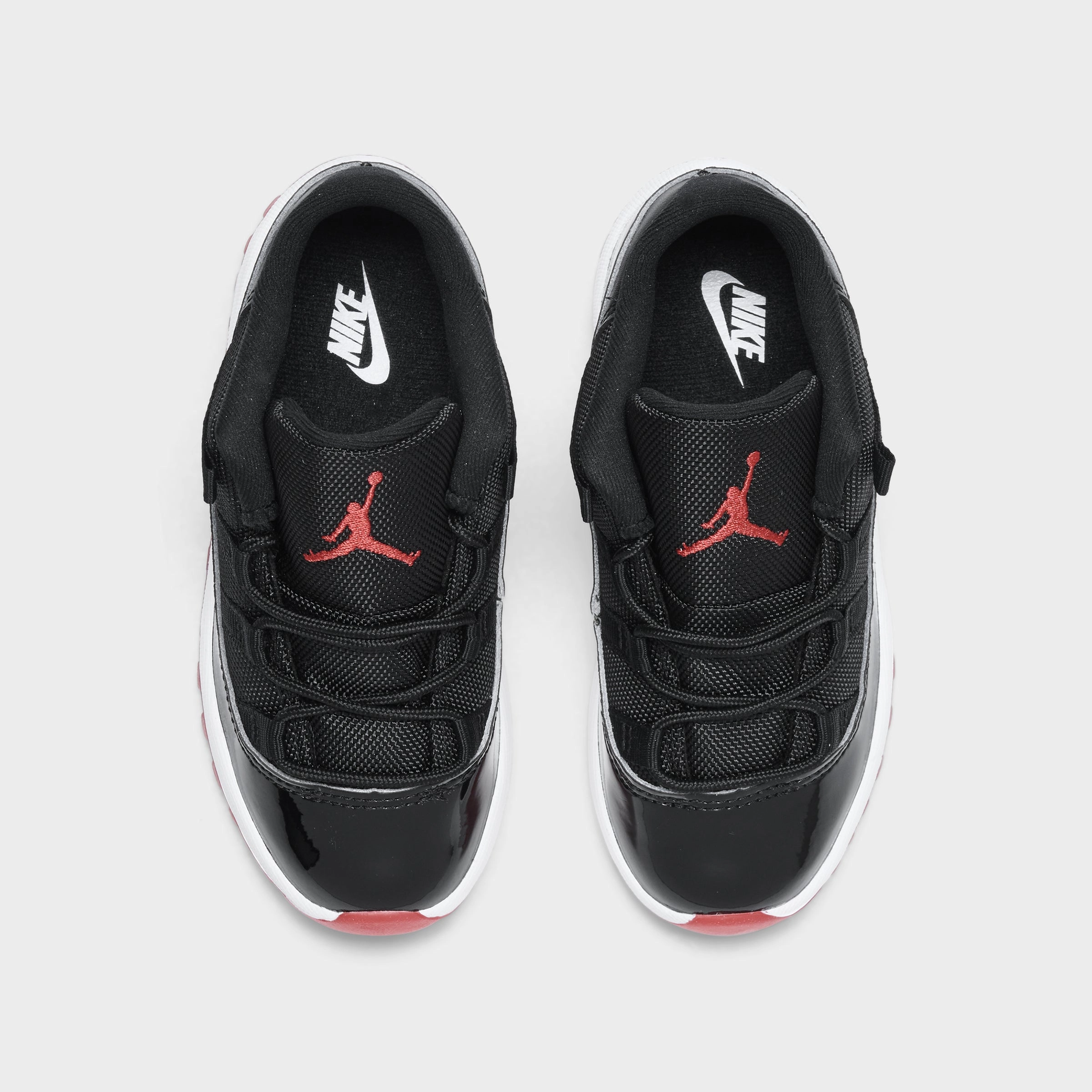 Jordan 11 Retro Low TD Black / Varsity Red - White Micro Grip Texture Outdoor Play Ready