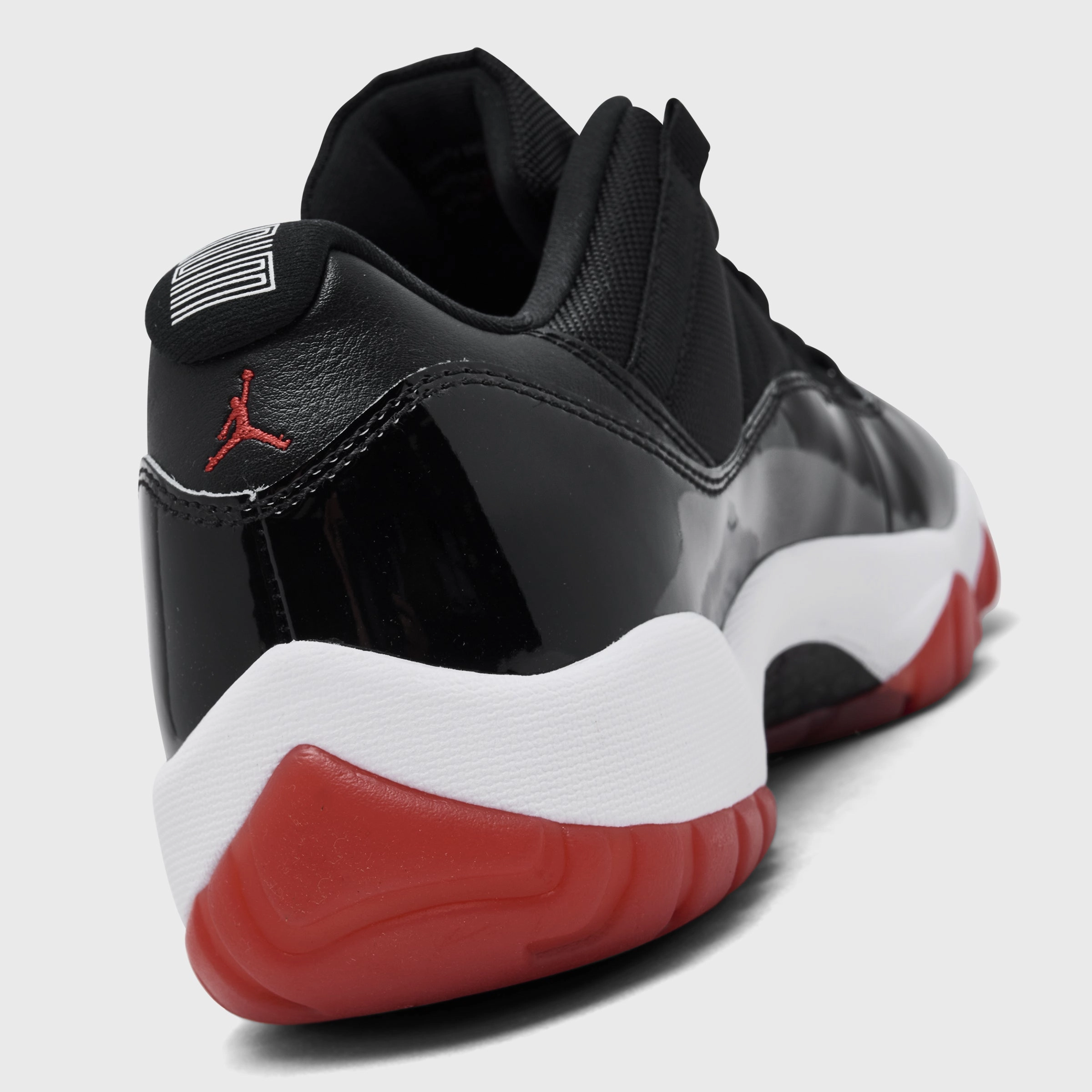 Multi Density Midsole Layering Hoop Fit Jordan 11 Retro Low Black / Varsity Red - White