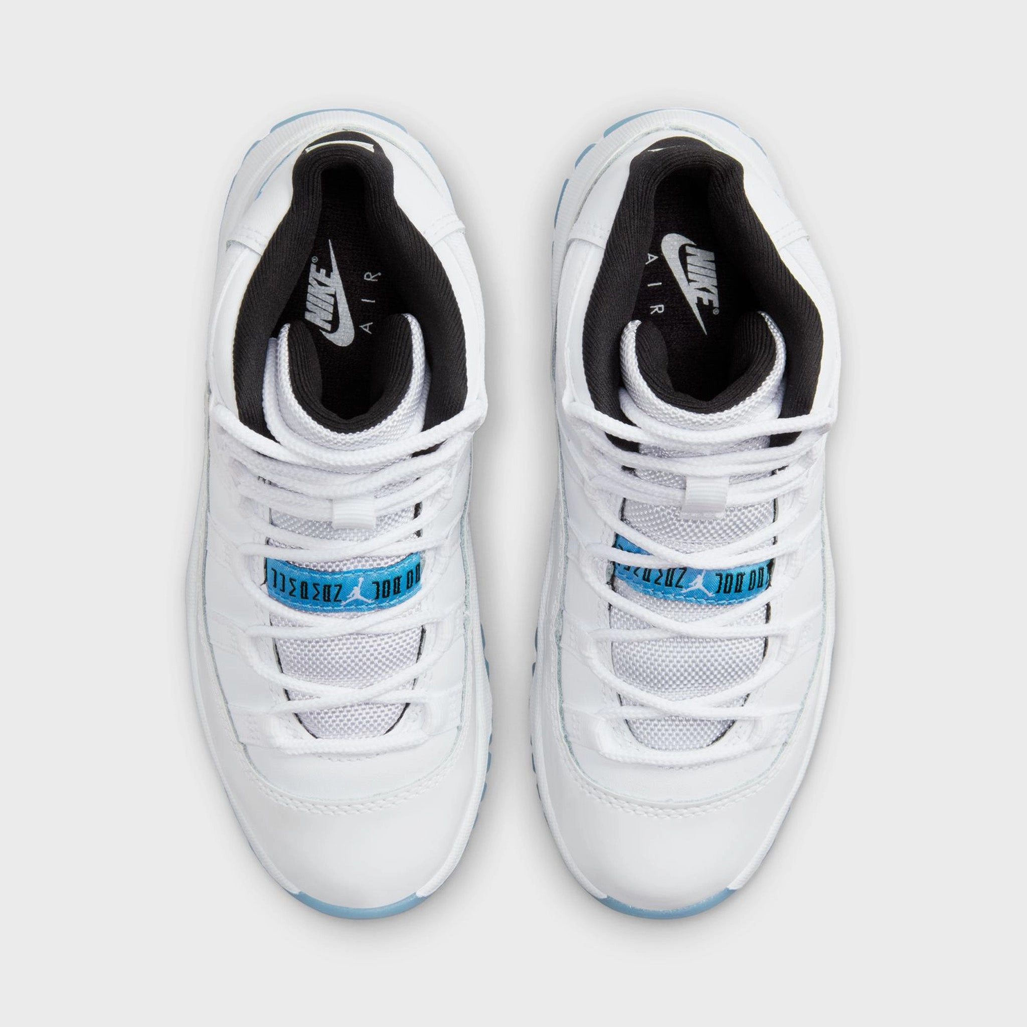 Jordan 11 Retro PS White / Legend Blue - Black Impact Absorption Tech Elite Pick