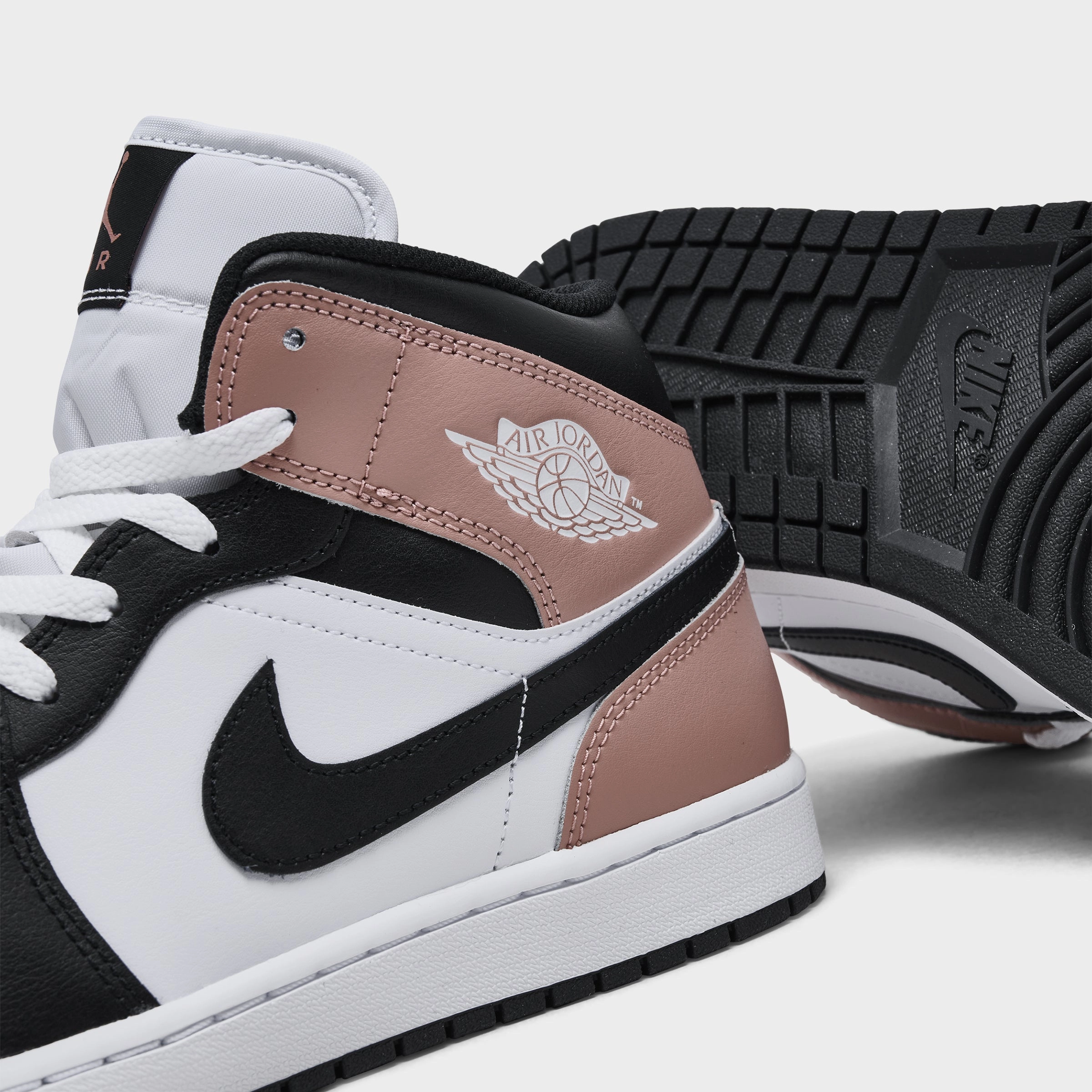 Jordan 1 Mid White / Black - Rust Pink Enhanced Lateral Stability Ankle Lock System