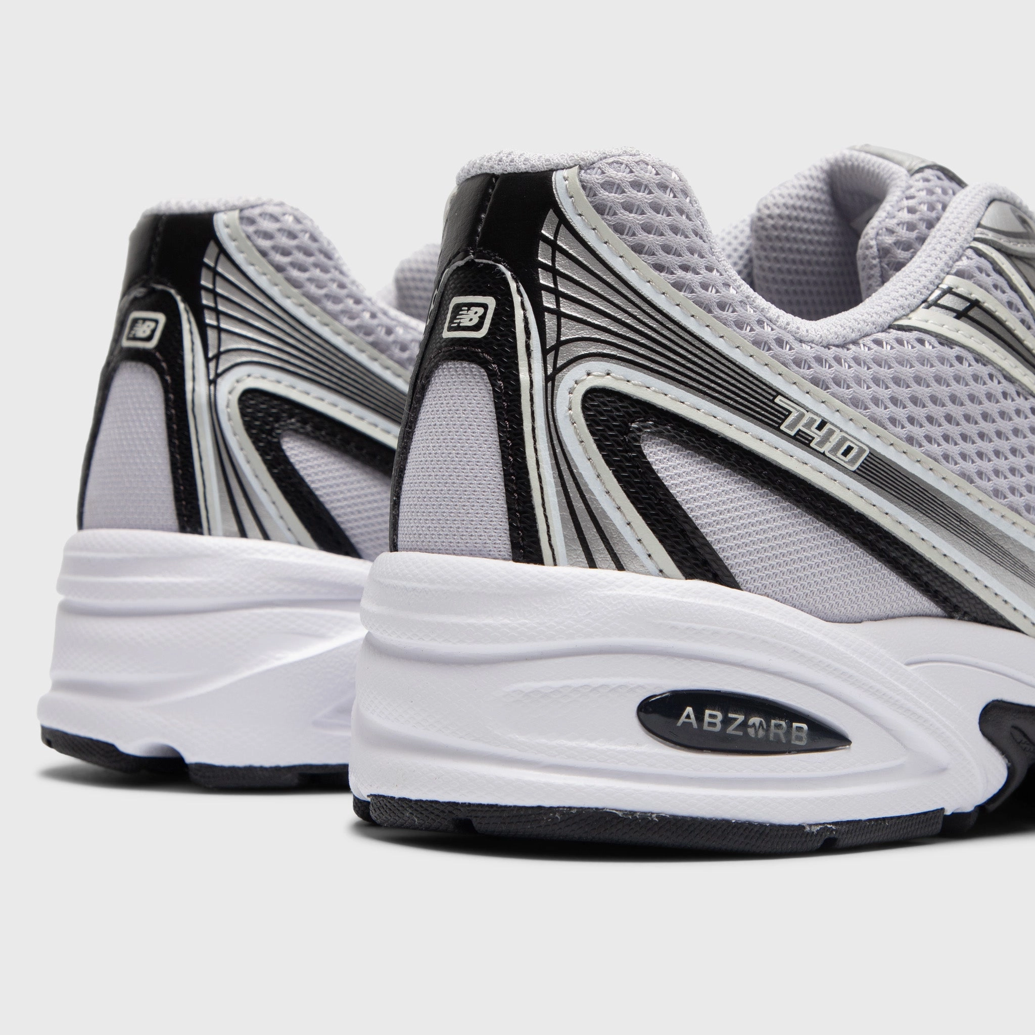 Efficient Comfort Competitive Edge New Balance 740 Silver / White