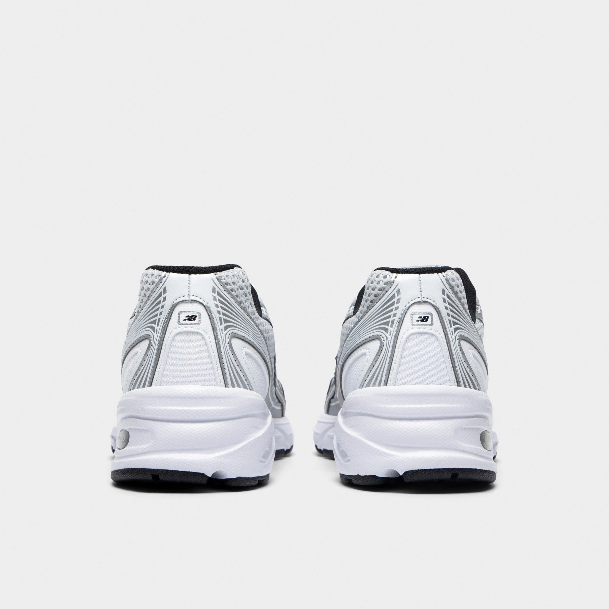 New Balance 740 White / Silver Metallic circular track running gear