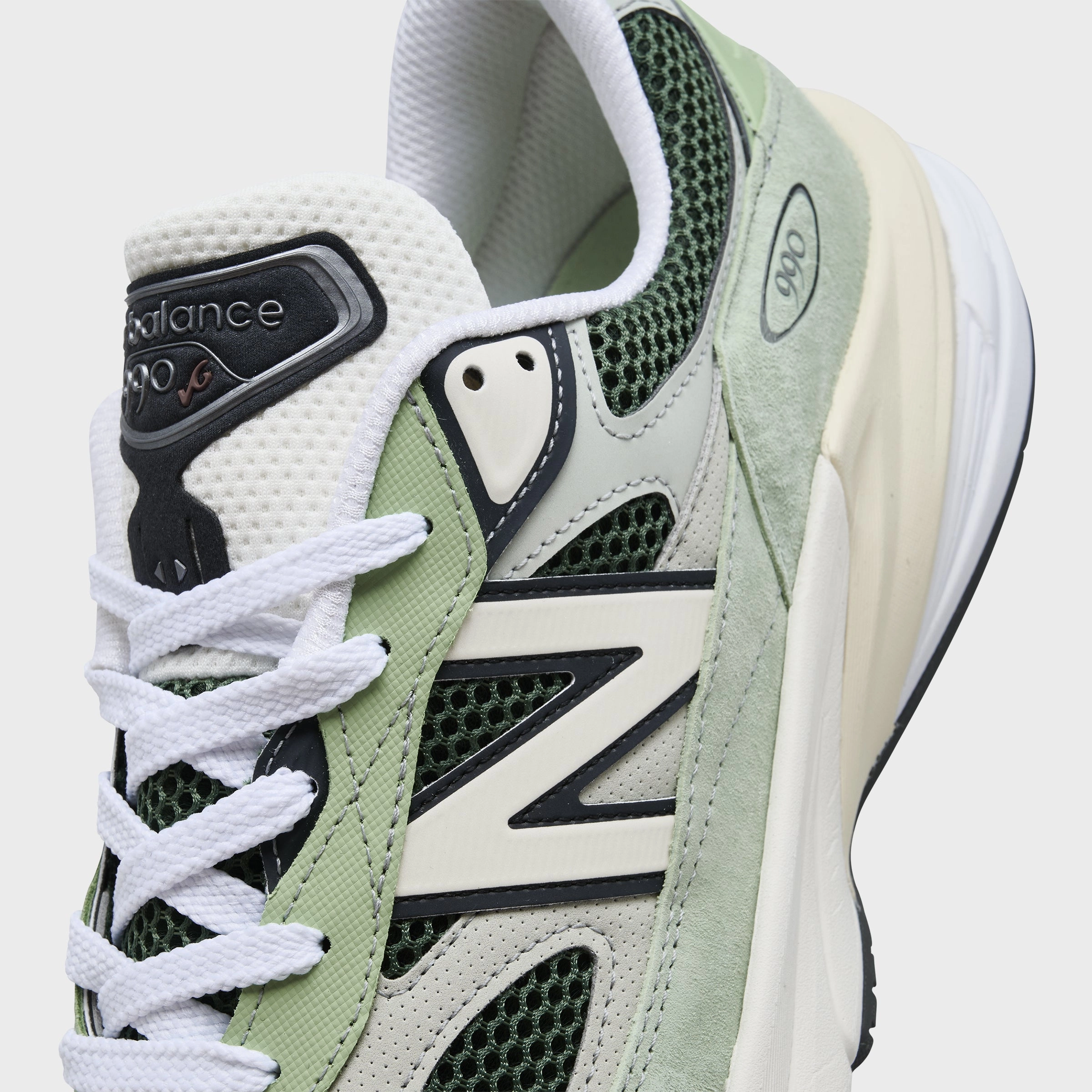 New Balance 990v6 MADE in USA Avocado / Natural Mint running in a frozen waterfall area shoes attention - to - detail