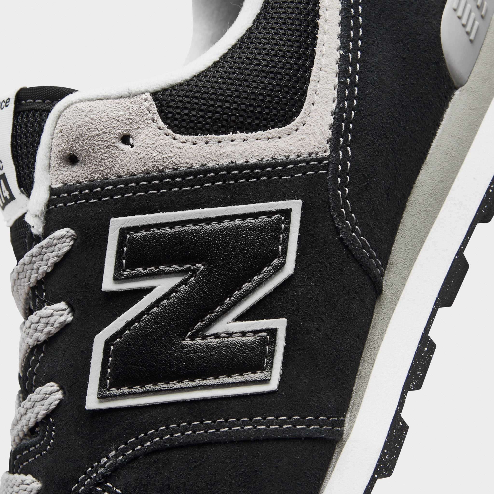 New Balance GC574EVB Black / White zip - up shoes Tough