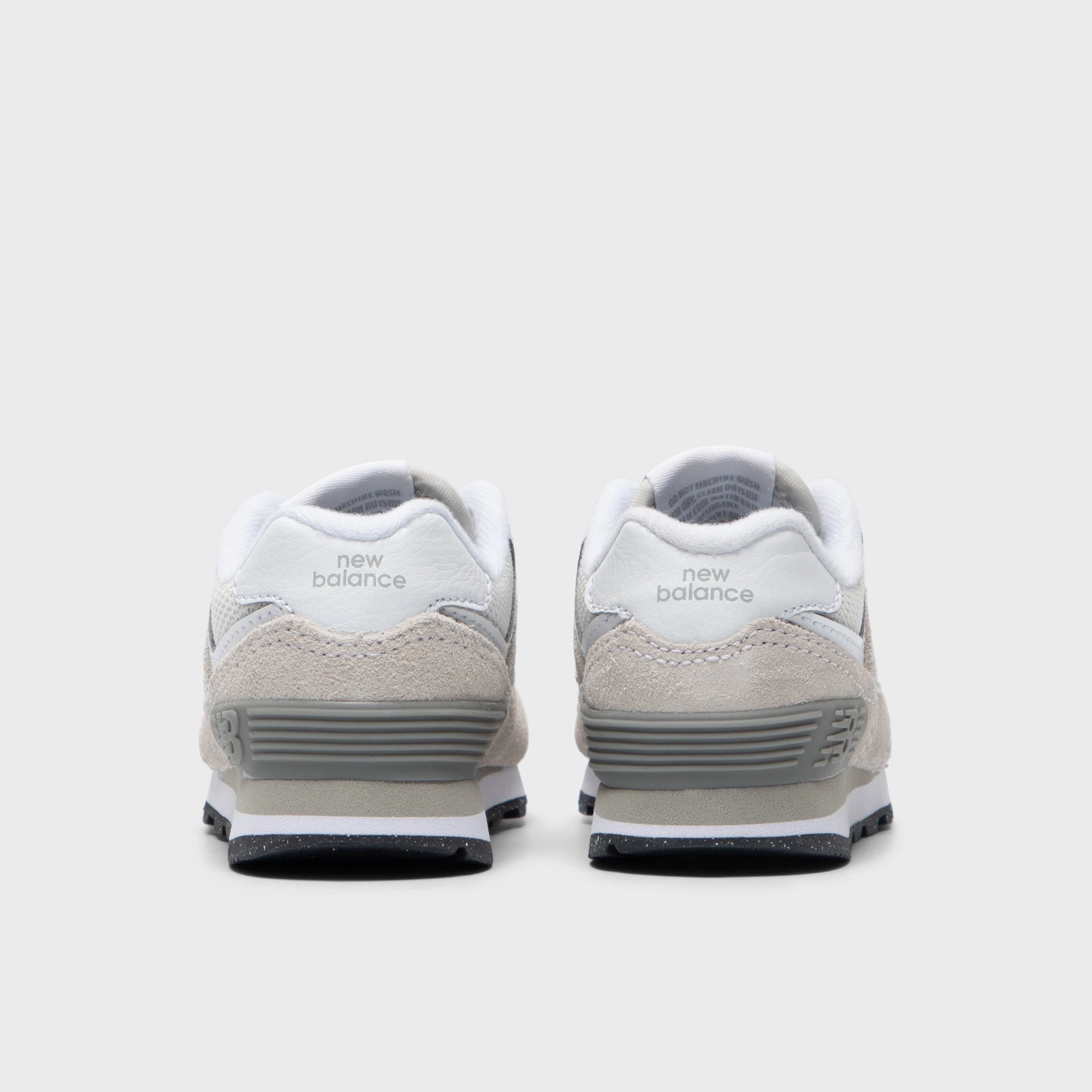 New Balance Infants' 574 Light Grey / White Adaptive Motion midfoot - strike shoe answer