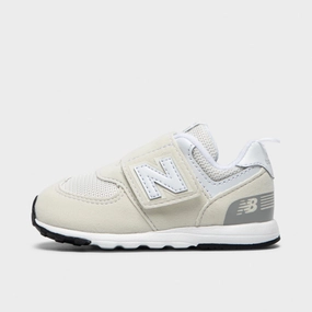 New Balance Infants' 574 Nimbus Cloud / White running in an airport area shoes camping shoes