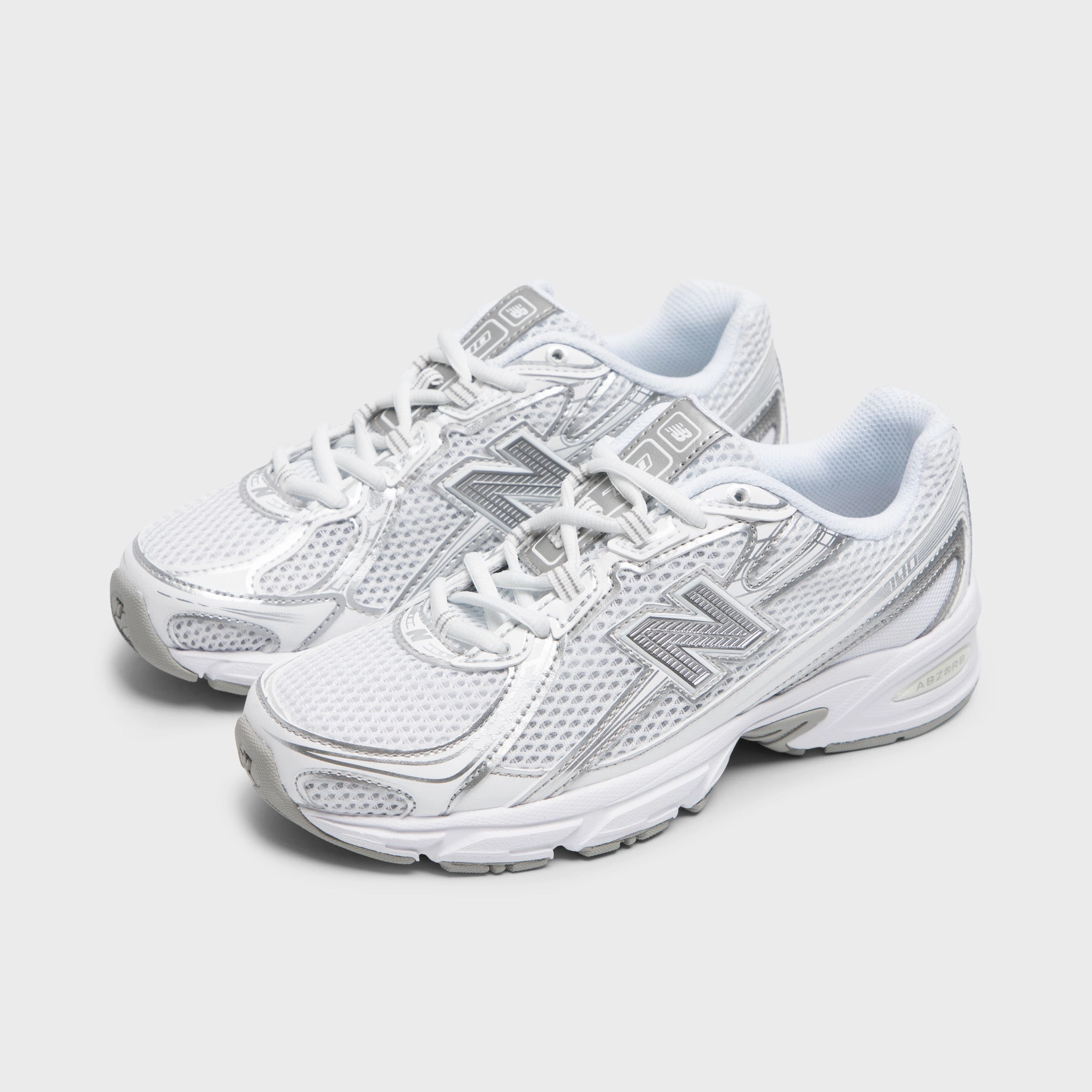 New Balance Juniors' 740 White / Silver Metallic Responsive sole