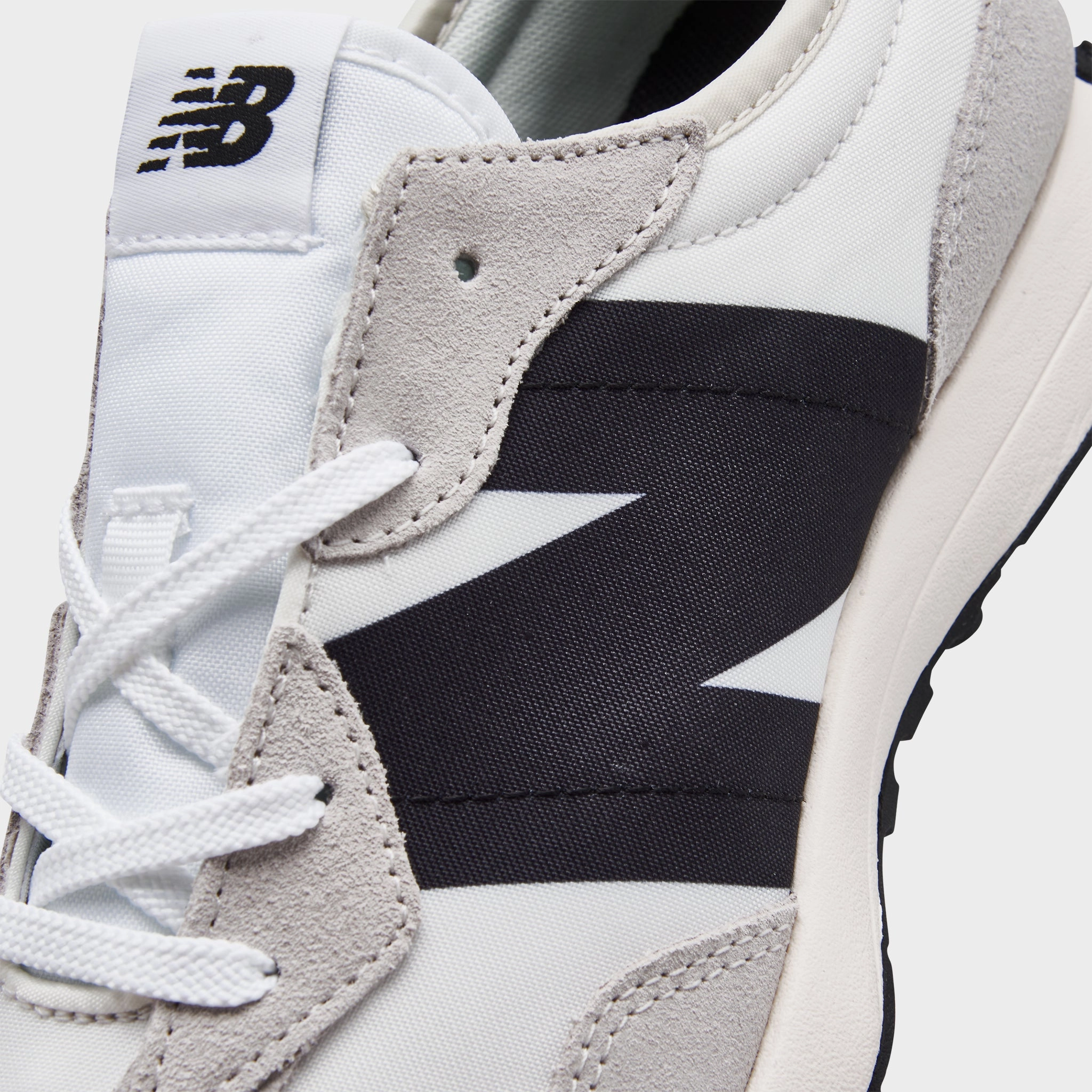 Anti-microbial treatment New Balance Juniors' GS327FE Silver Birch / Black