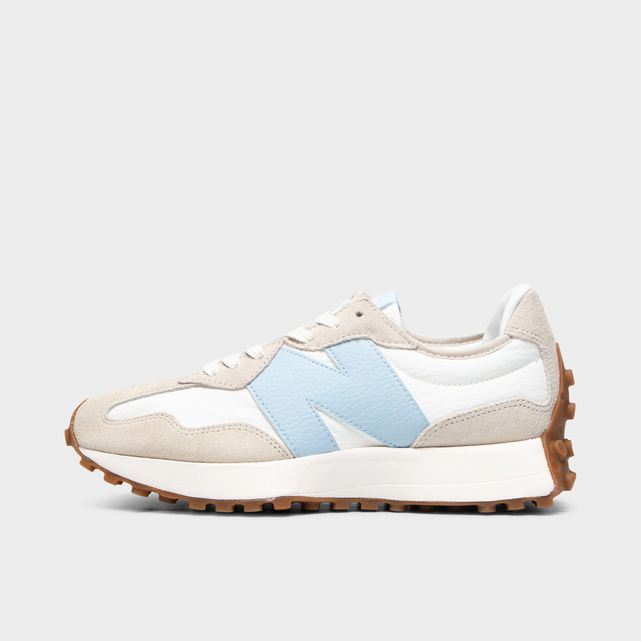 running in a travertine pool area shoes daily - use New Balance Women's 327 Tan / Light Blue
