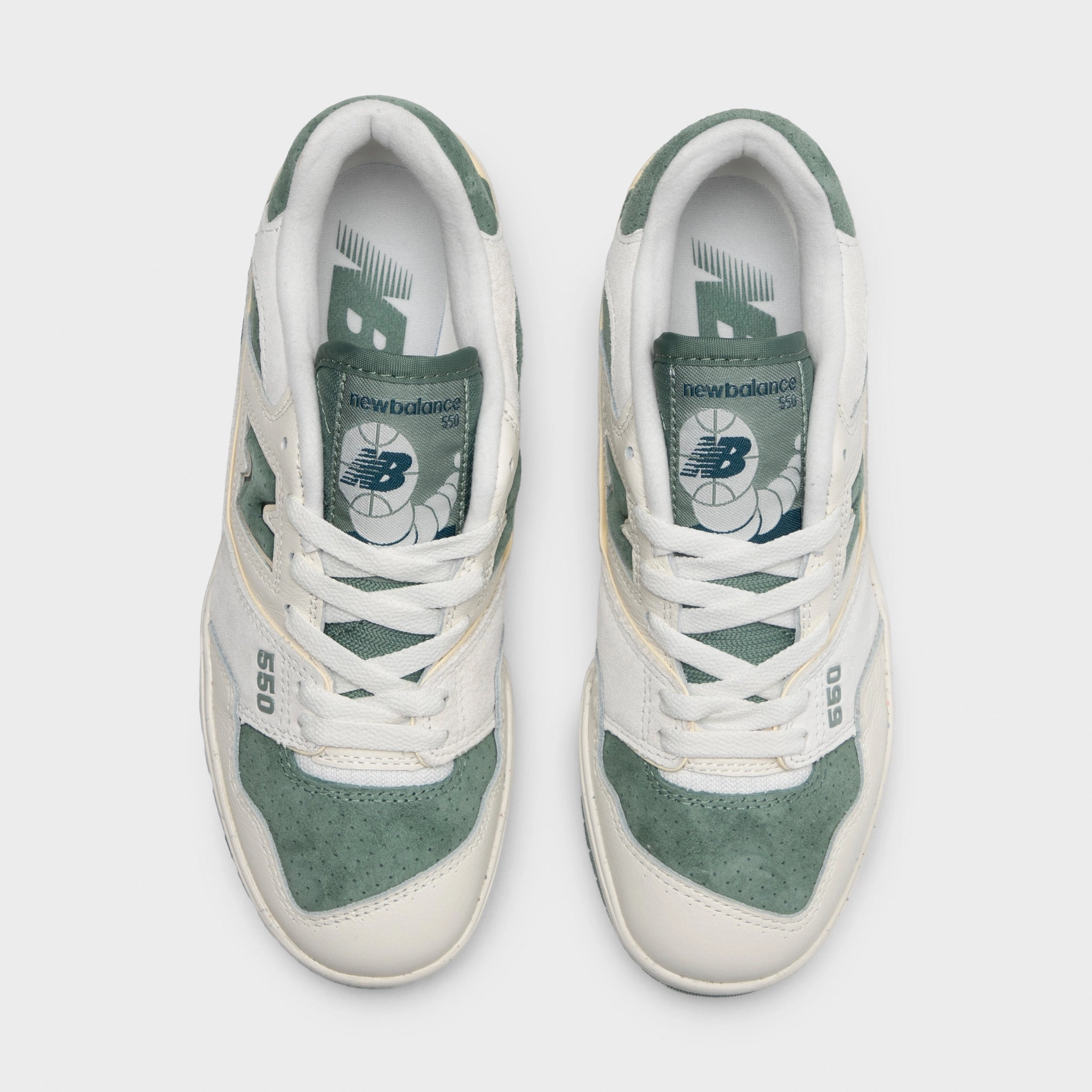 New Balance Women's 550 Sea Salt / Dark Juniper Multi Directional Flex Grooves