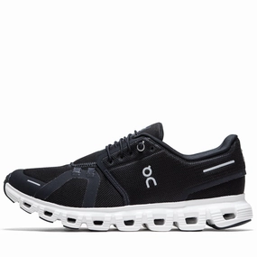 On Cloud 6 - Black/White running in a dock area shoes