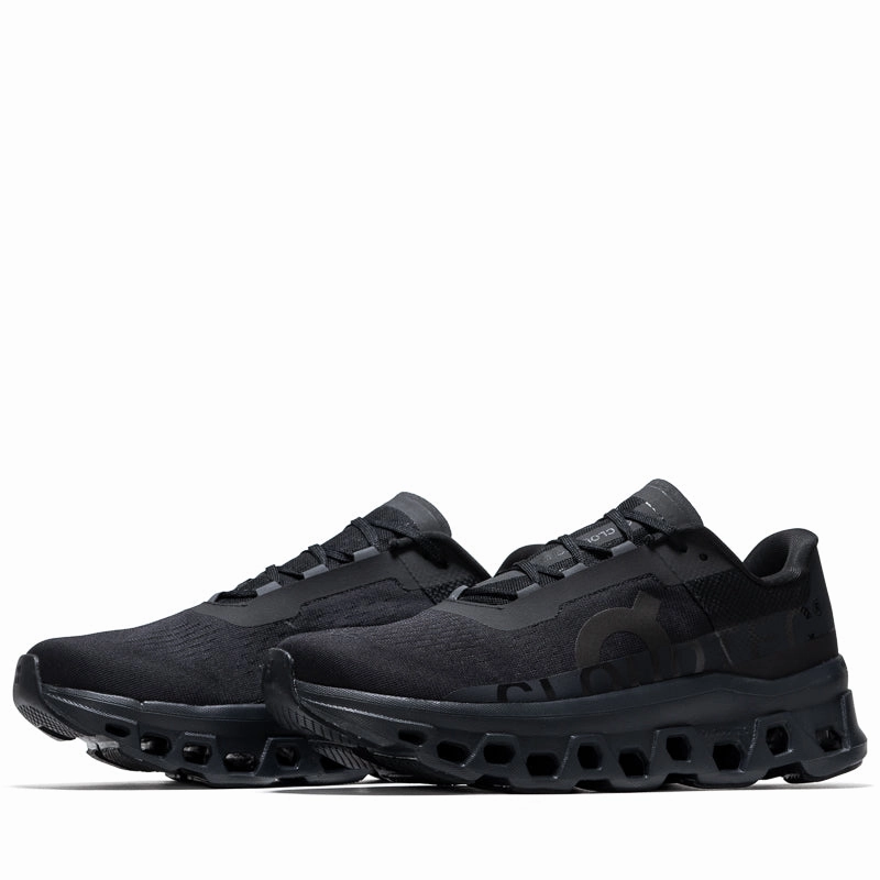 On Cloudmonster - All Black running in a cycling studio shoes