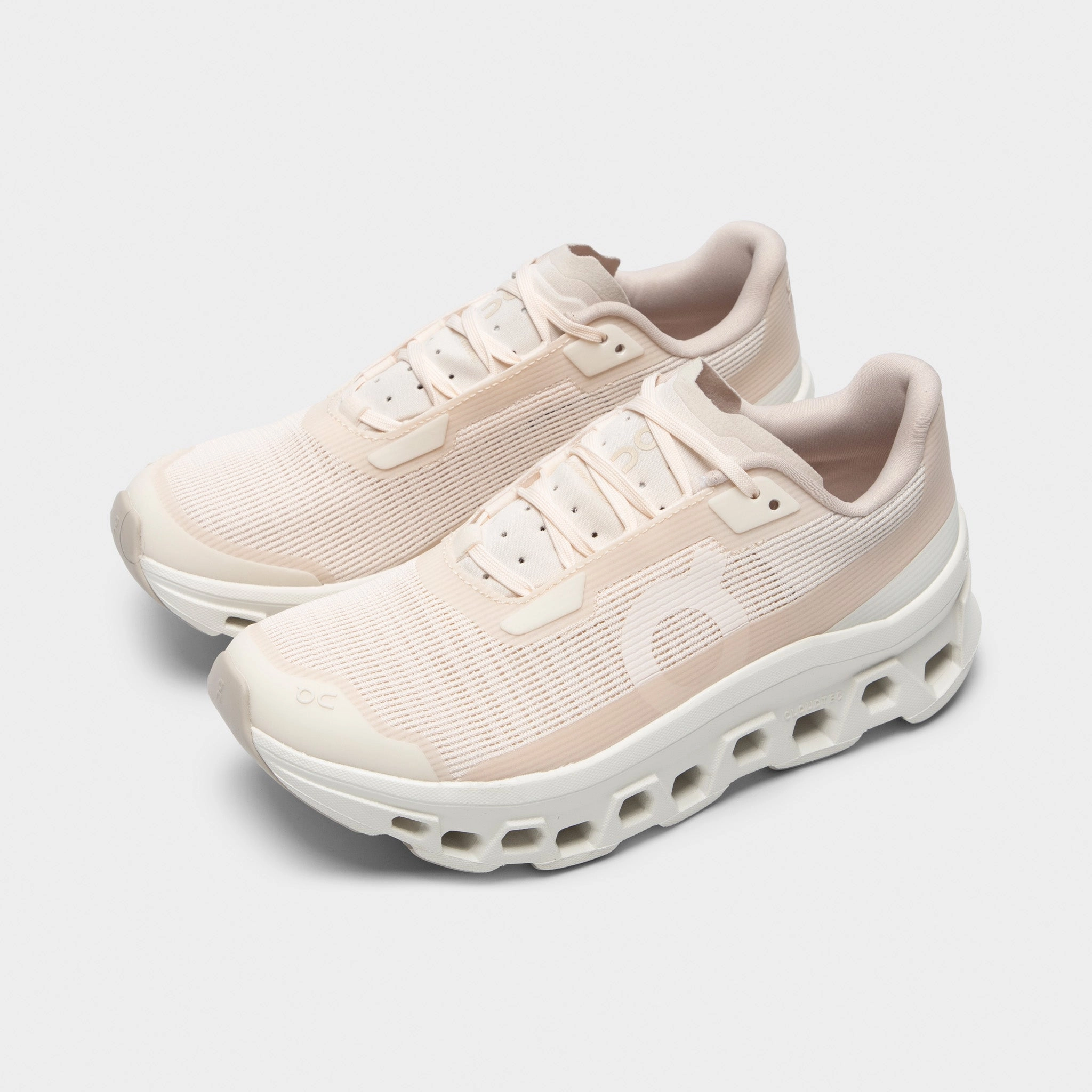 On Women's Cloudmonster Void Dew / Ivory Hard - wearing Sunrise Run