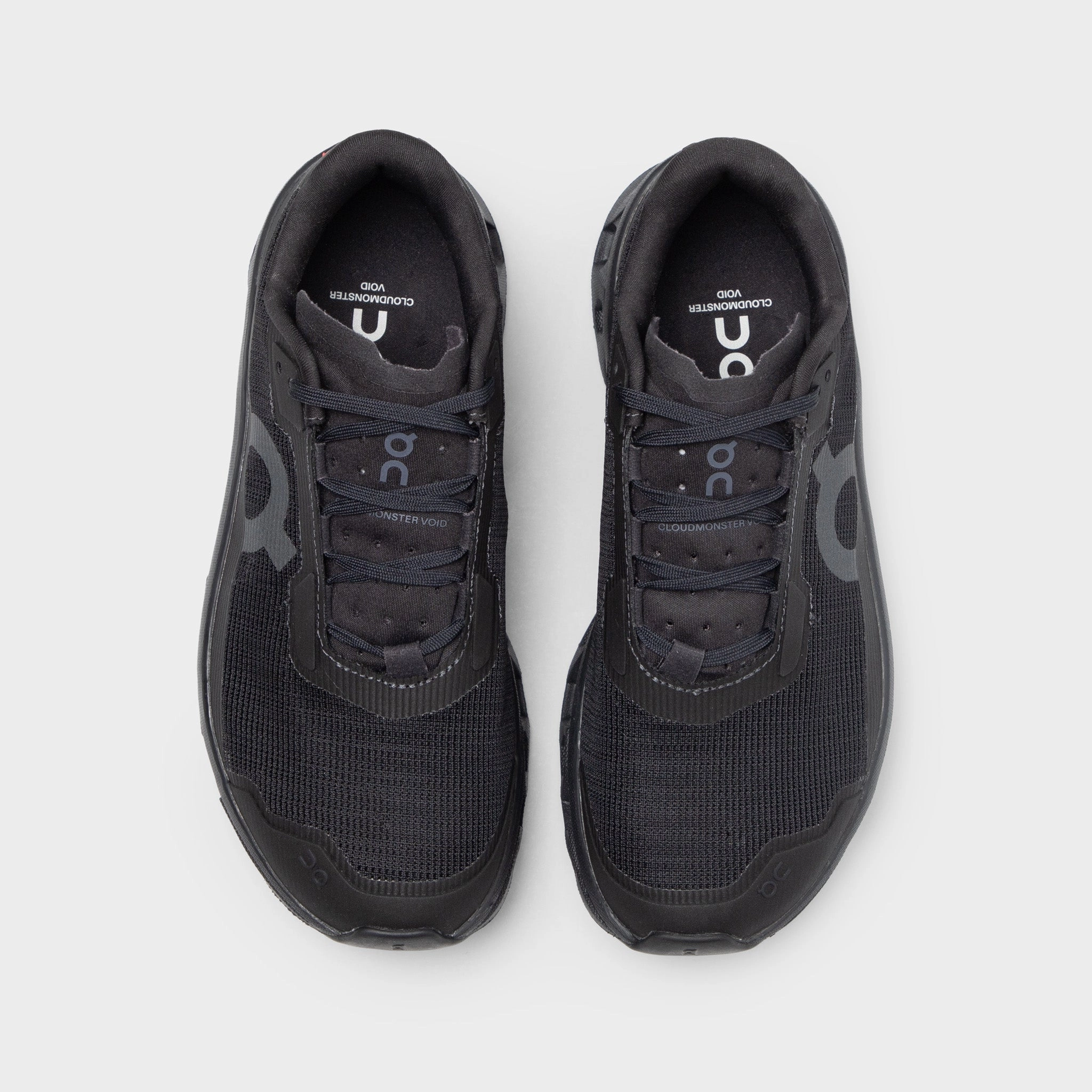Soft surface cushioning police - training running shoes On Women's Monster Void Black / Black