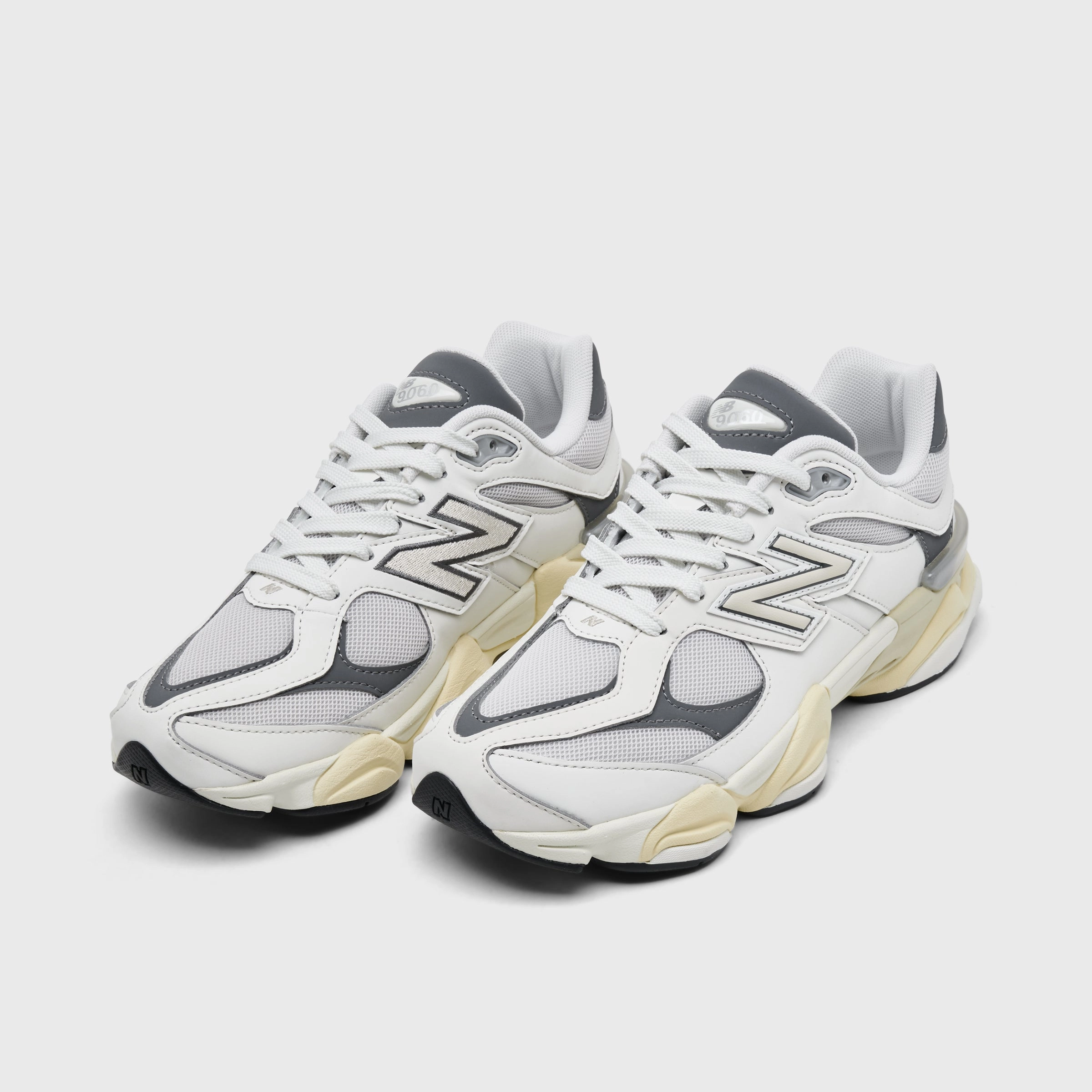 Smooth interior running with dog shoes New Balance Juniors' 9060 Sea Salt / Castlerock
