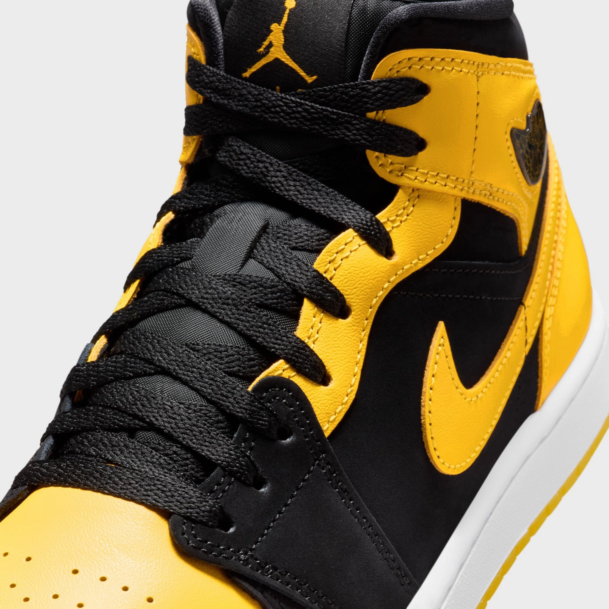 Jordan 1 Mid Black / Varsity Maize - White Comfort Fit Technology