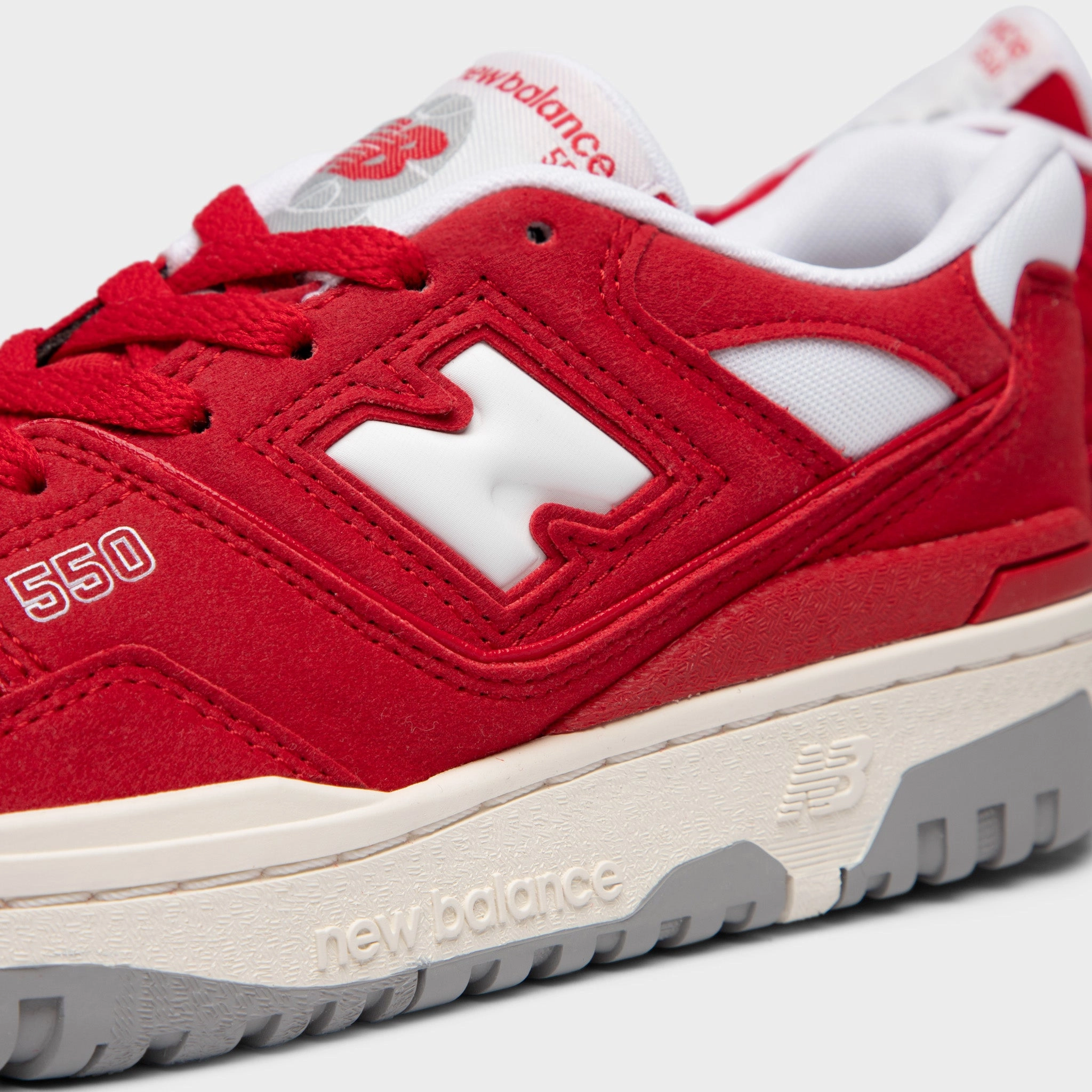 New Balance Juniors' 550 Team Red / White rainy - day shoes Heart - rate control