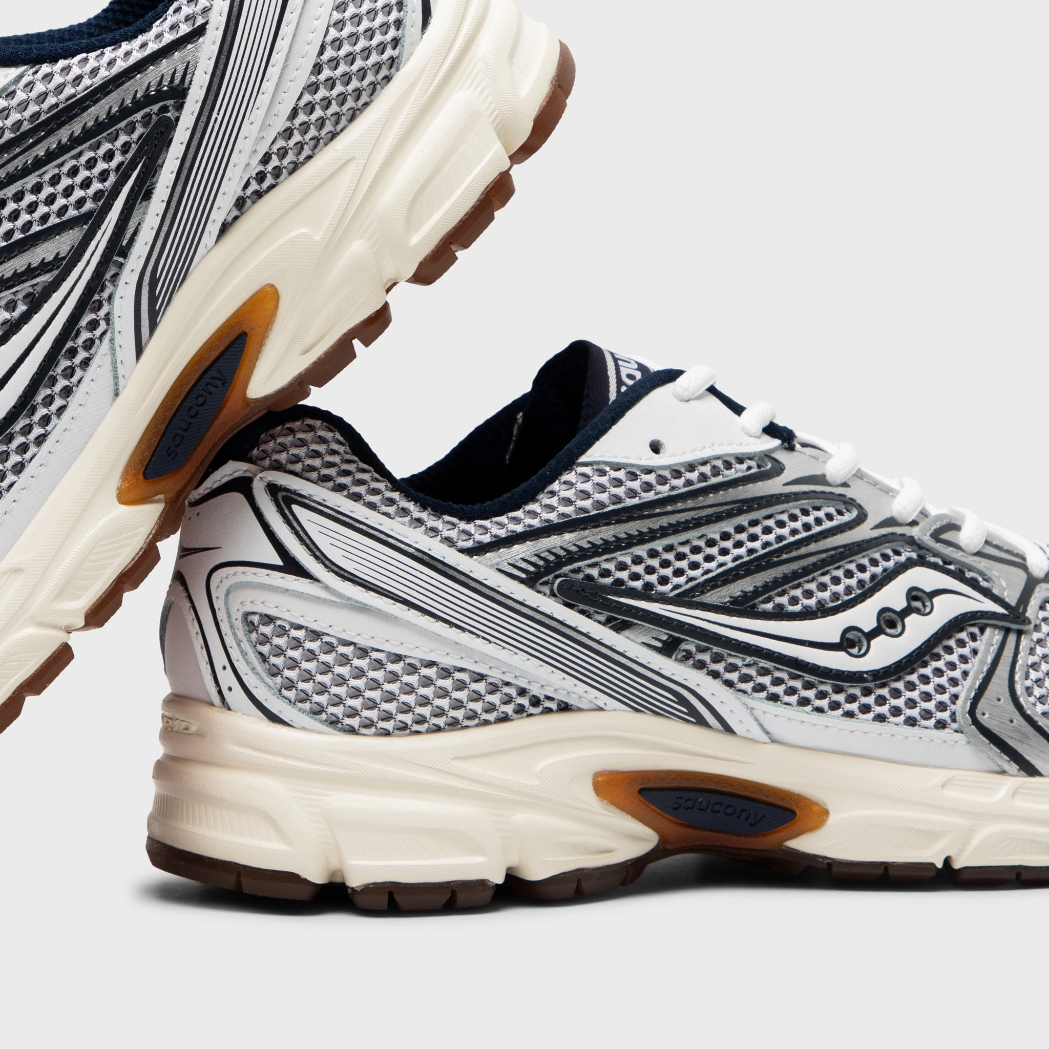 Saucony Ride Millennium White / Navy Step Relief