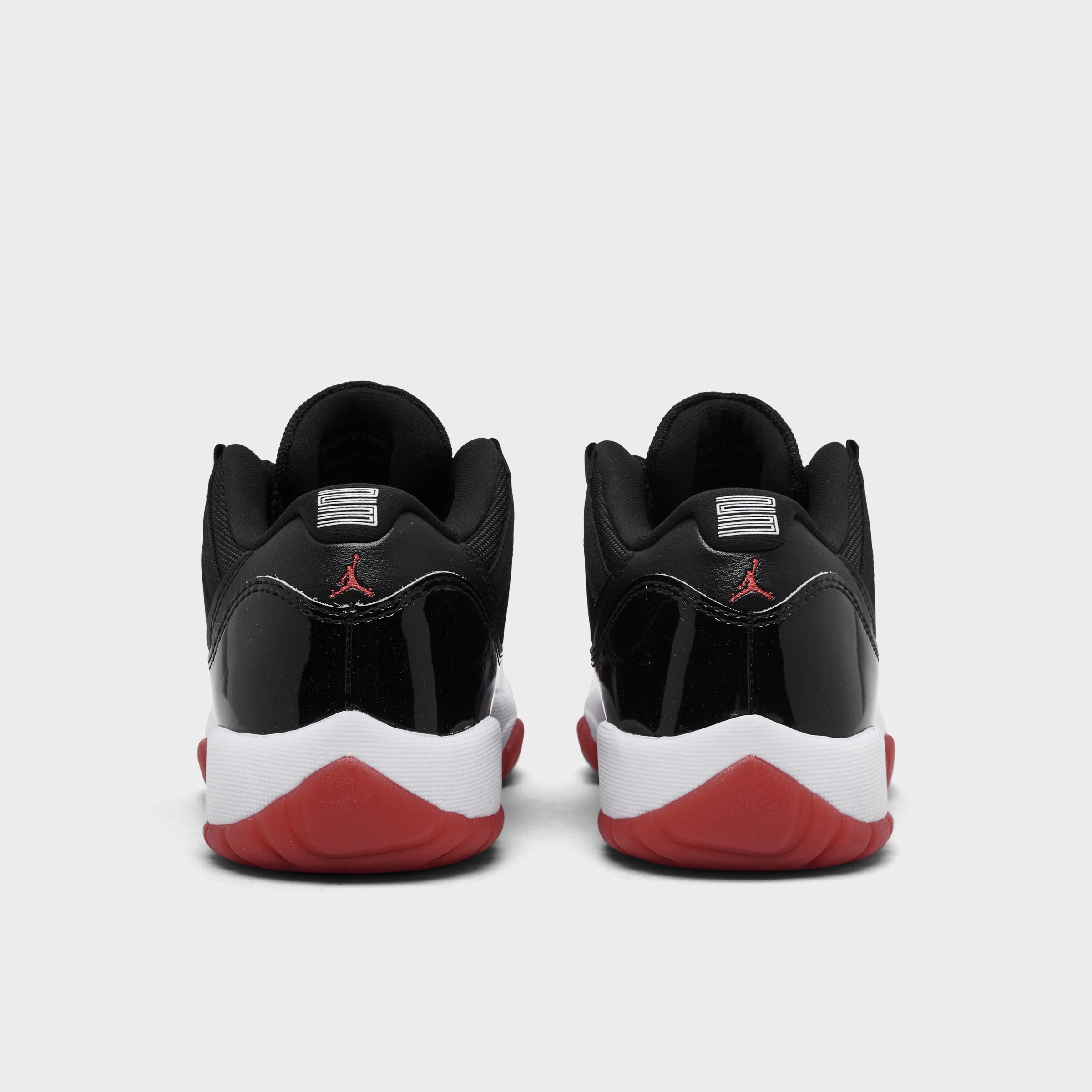 Jordan 11 Retro Low GS Black / Varsity Red - White Arch Reinforcement Dual Density Outsole