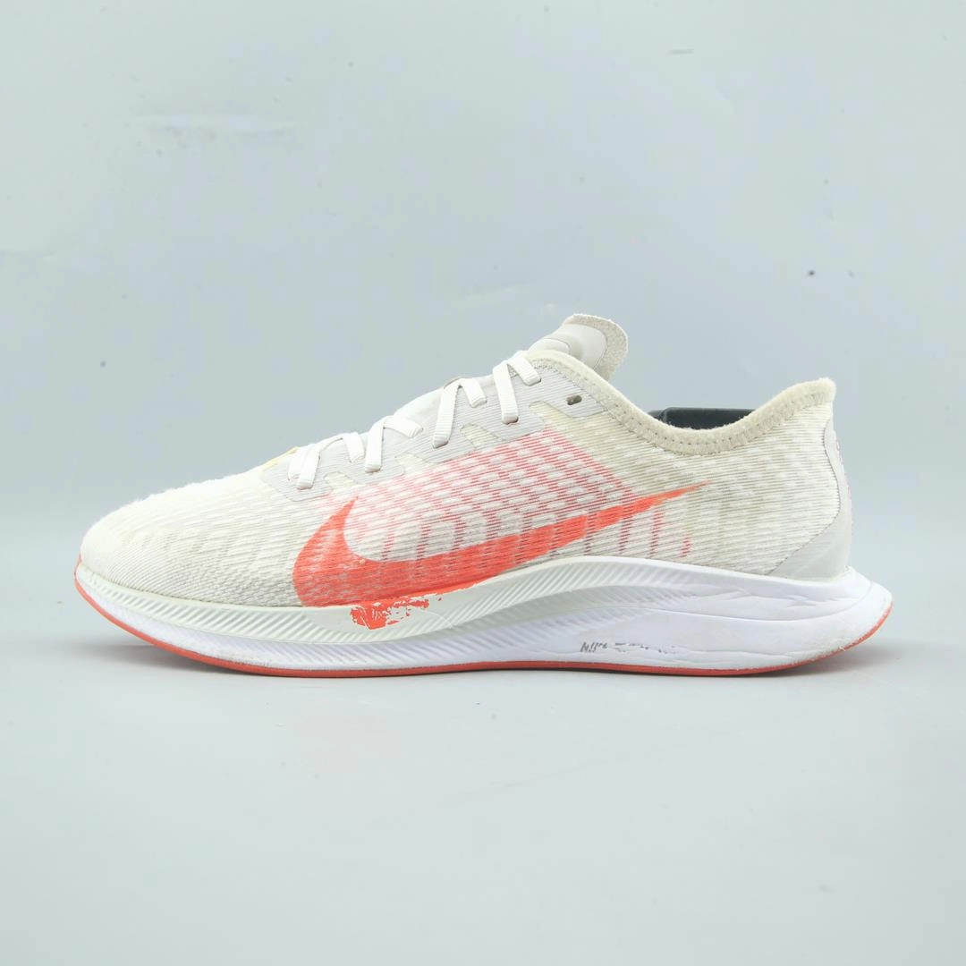 sports socks running in a baseball field area shoes NIKE ZOOM PEGASUS TURBO 2