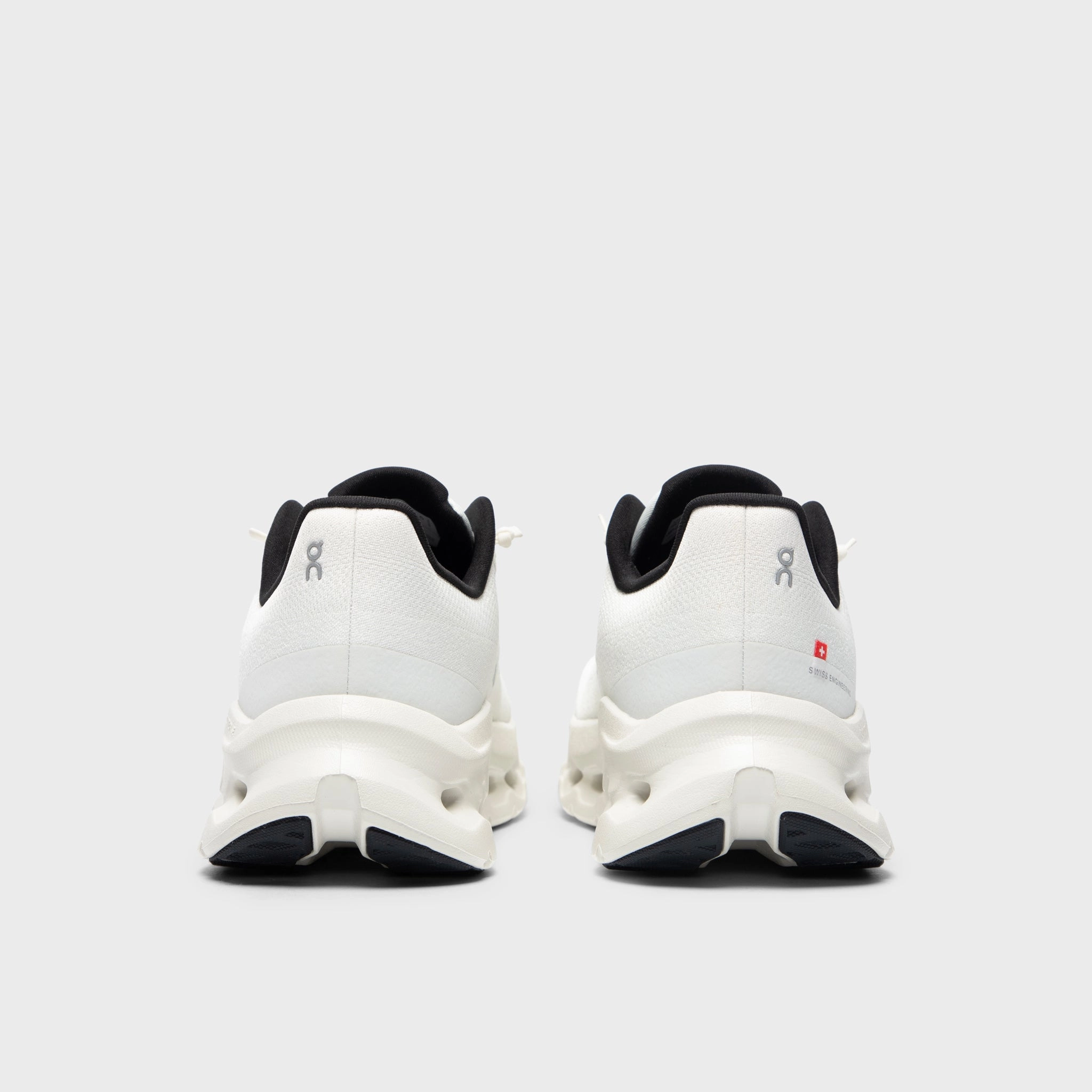 On Cloudtilt 1 Pearl / Ice running in a sports complex shoes foam sole shoe trait