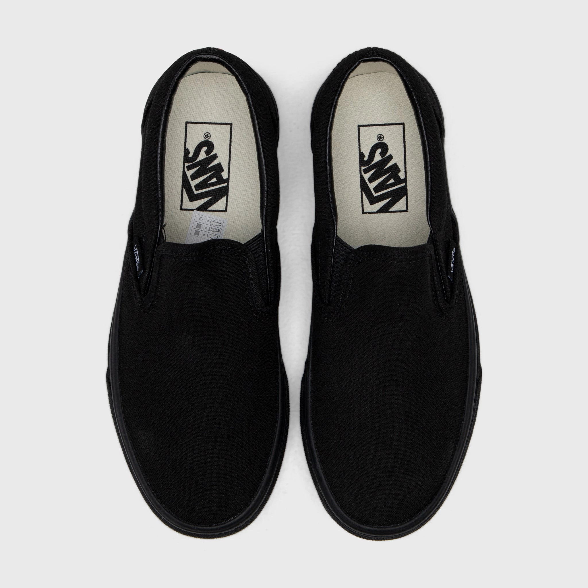Tread Pattern Herd Path Vans Classic Slip-On Black / Black