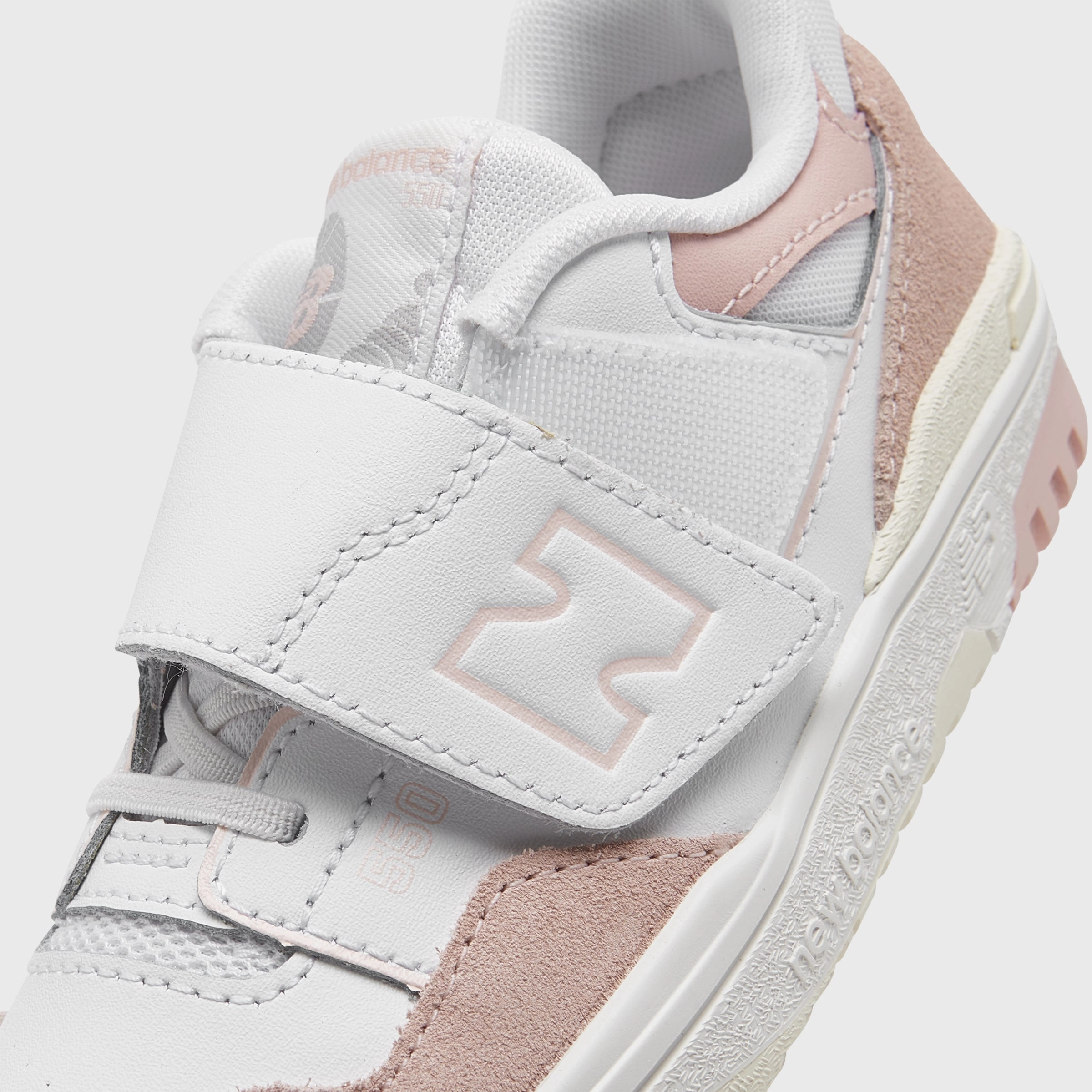 New Balance Infants' 550 White / Pink Haze Multi Directional Flex Zones Jump Ready