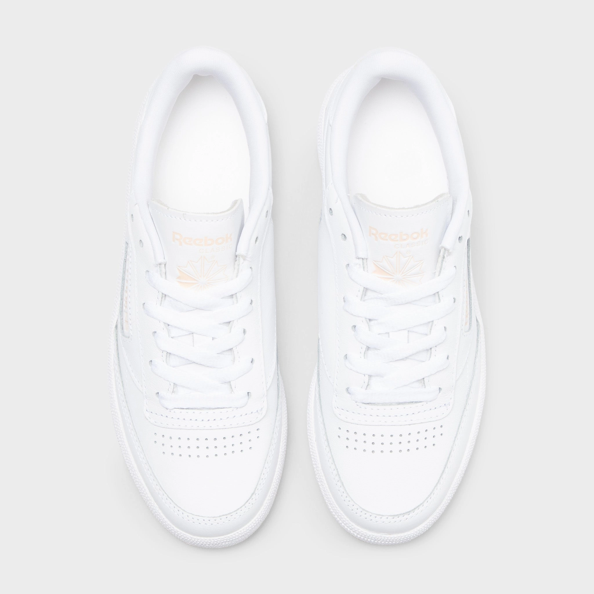 Reebok Women's Club C 85 White / Bleached Peach Family Fit Street Edge